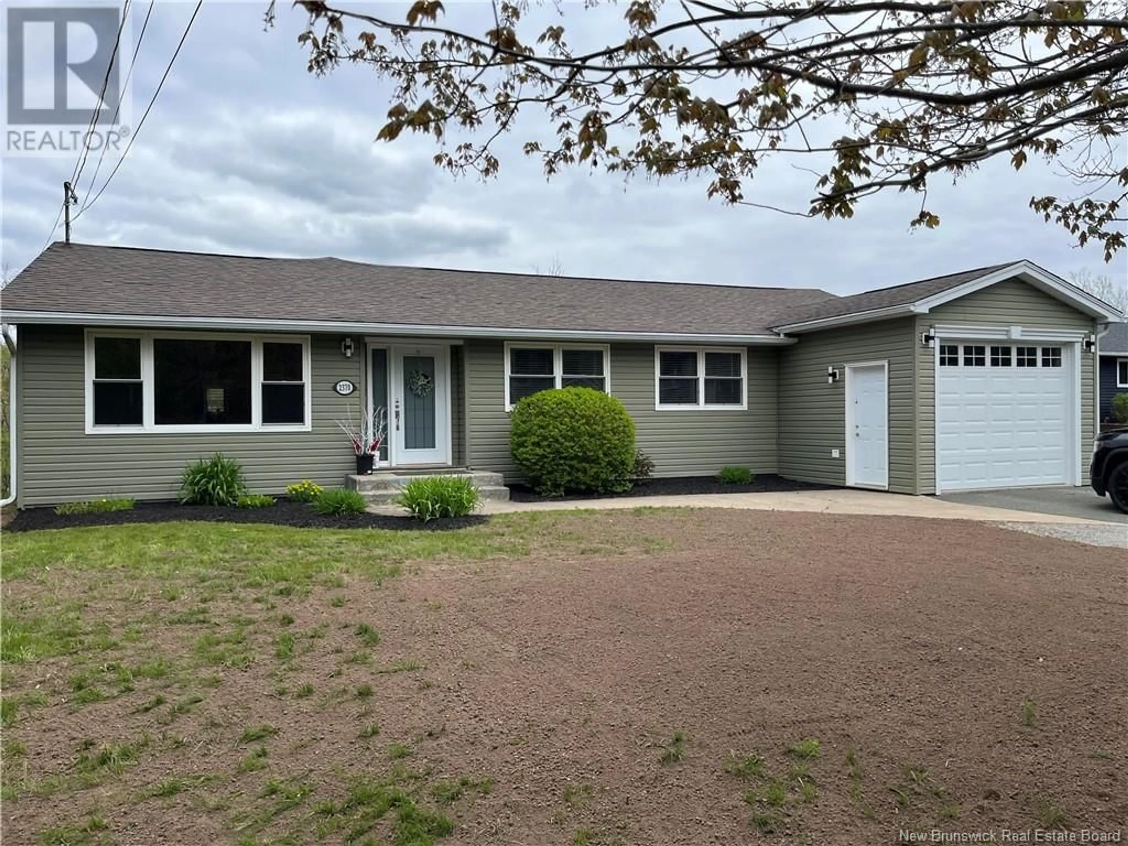 Home with vinyl exterior material, street for 2370 WESTFIELD RD, Saint John New Brunswick E2M6J3