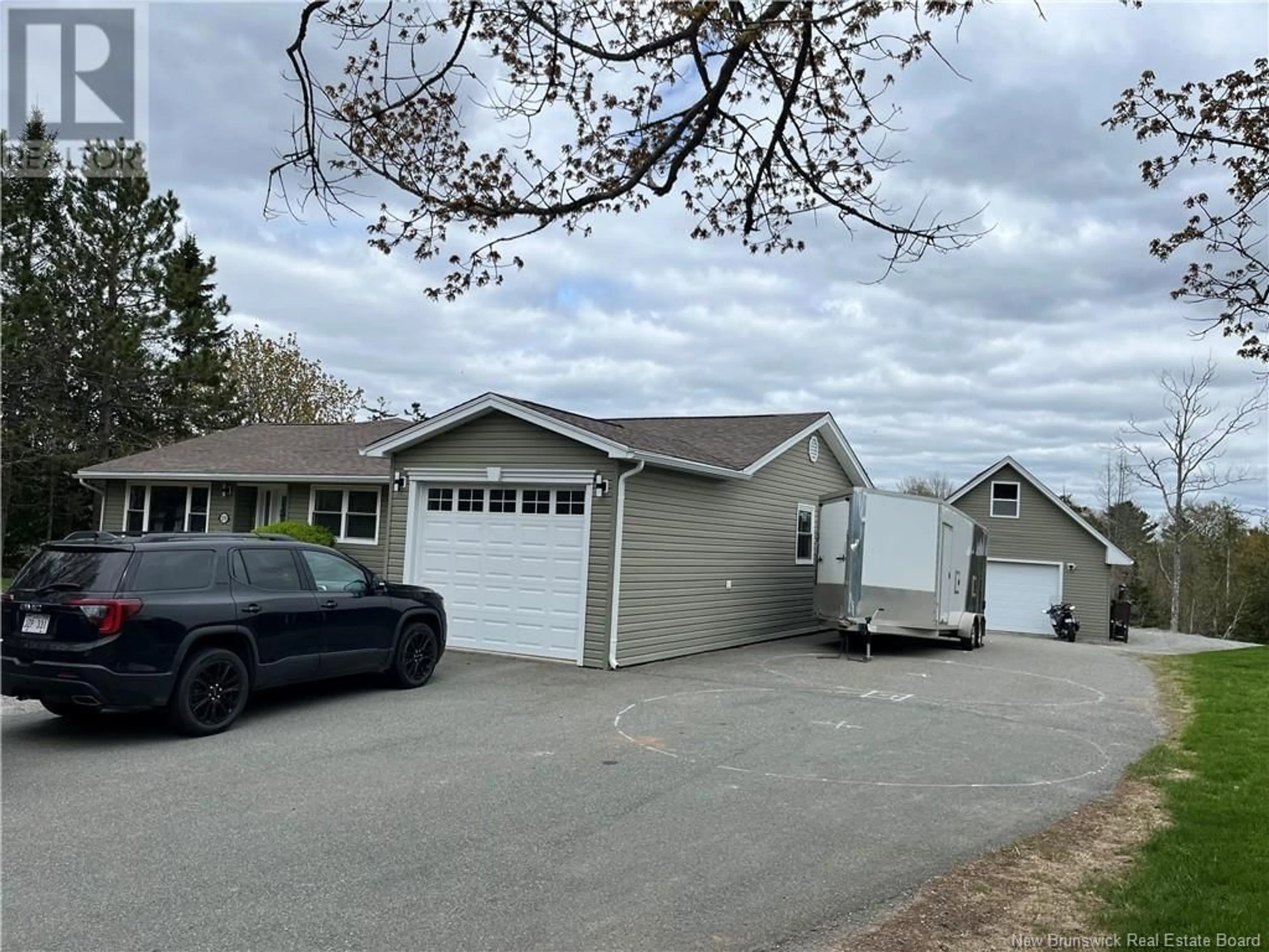 A pic from outside/outdoor area/front of a property/back of a property/a pic from drone, street for 2370 WESTFIELD RD, Saint John New Brunswick E2M6J3