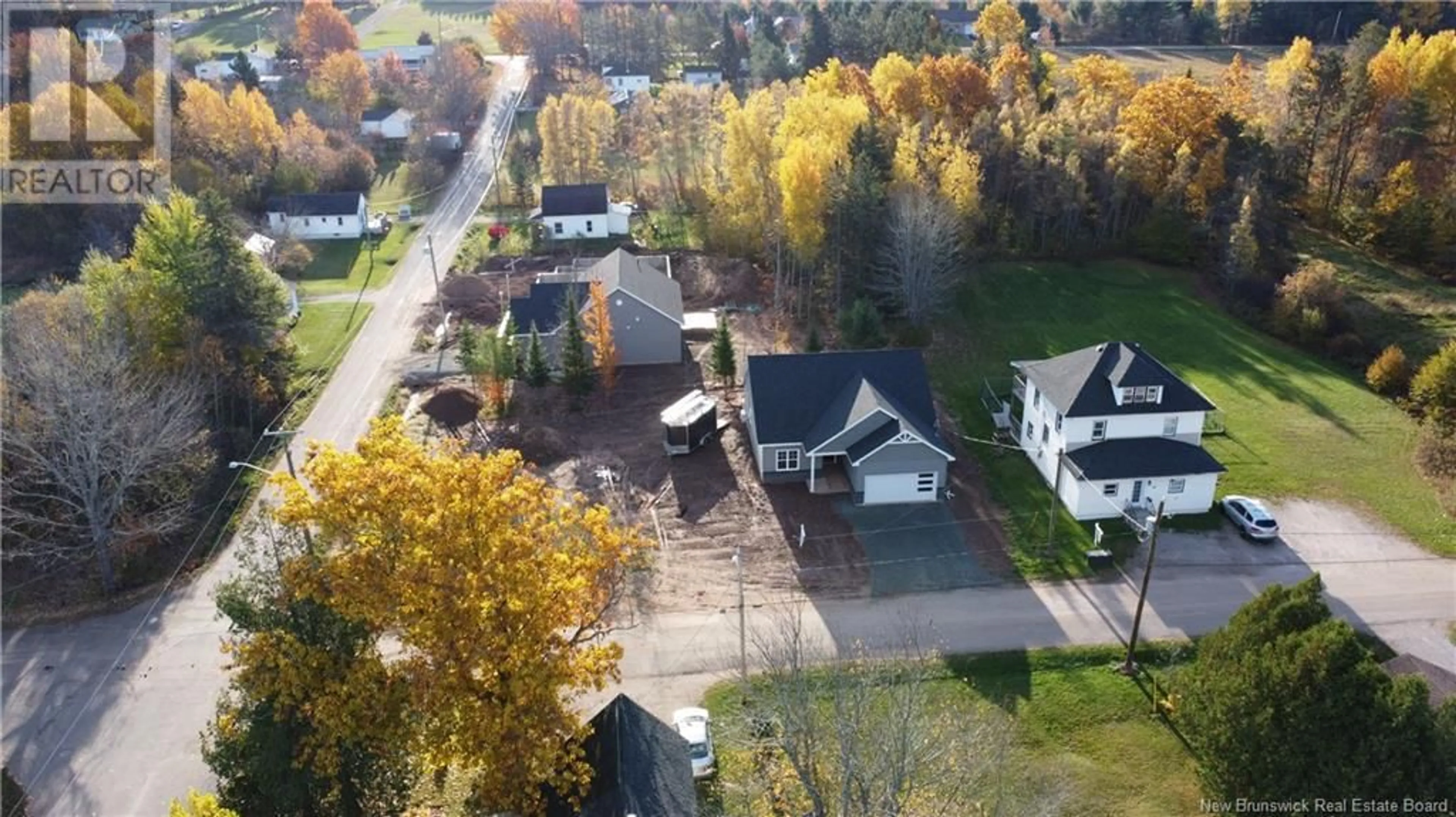 A pic from outside/outdoor area/front of a property/back of a property/a pic from drone, street for 42 CONNOR STREET, Petitcodiac New Brunswick E4Z4G2