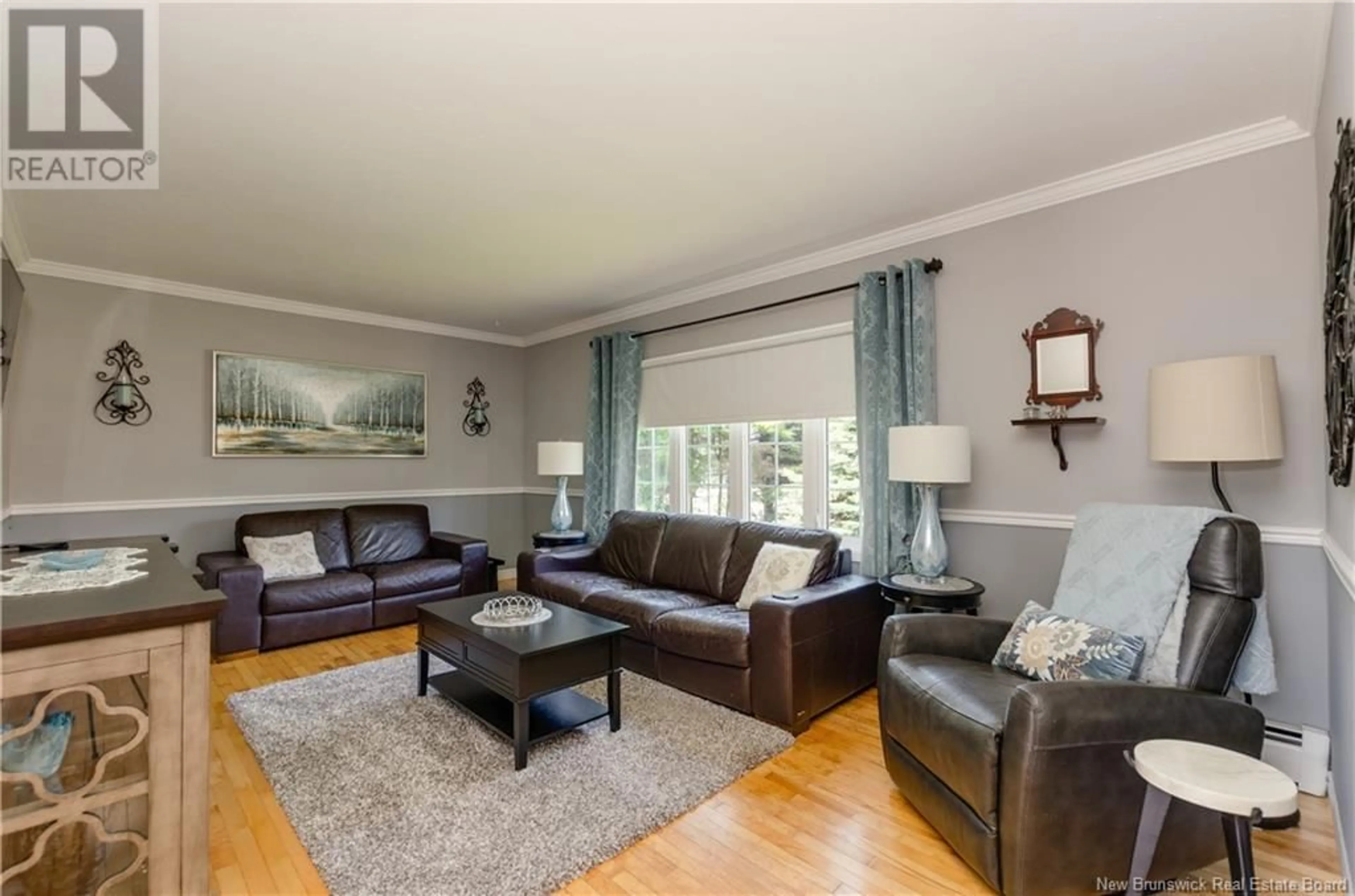 Living room with furniture, wood/laminate floor for 1 BELMONT STREET, Moncton New Brunswick E1C6X3