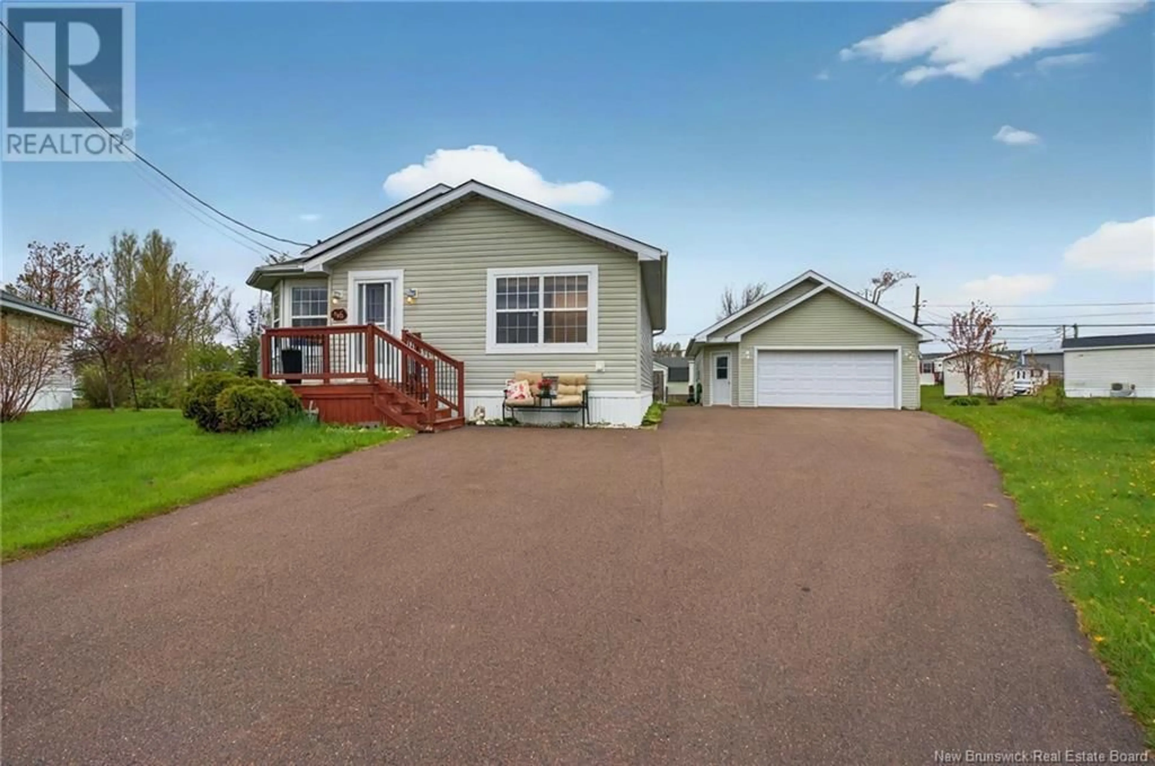 Home with vinyl exterior material, street for 46 RICHIBUCTOU LANE, Dieppe New Brunswick E1A7N1