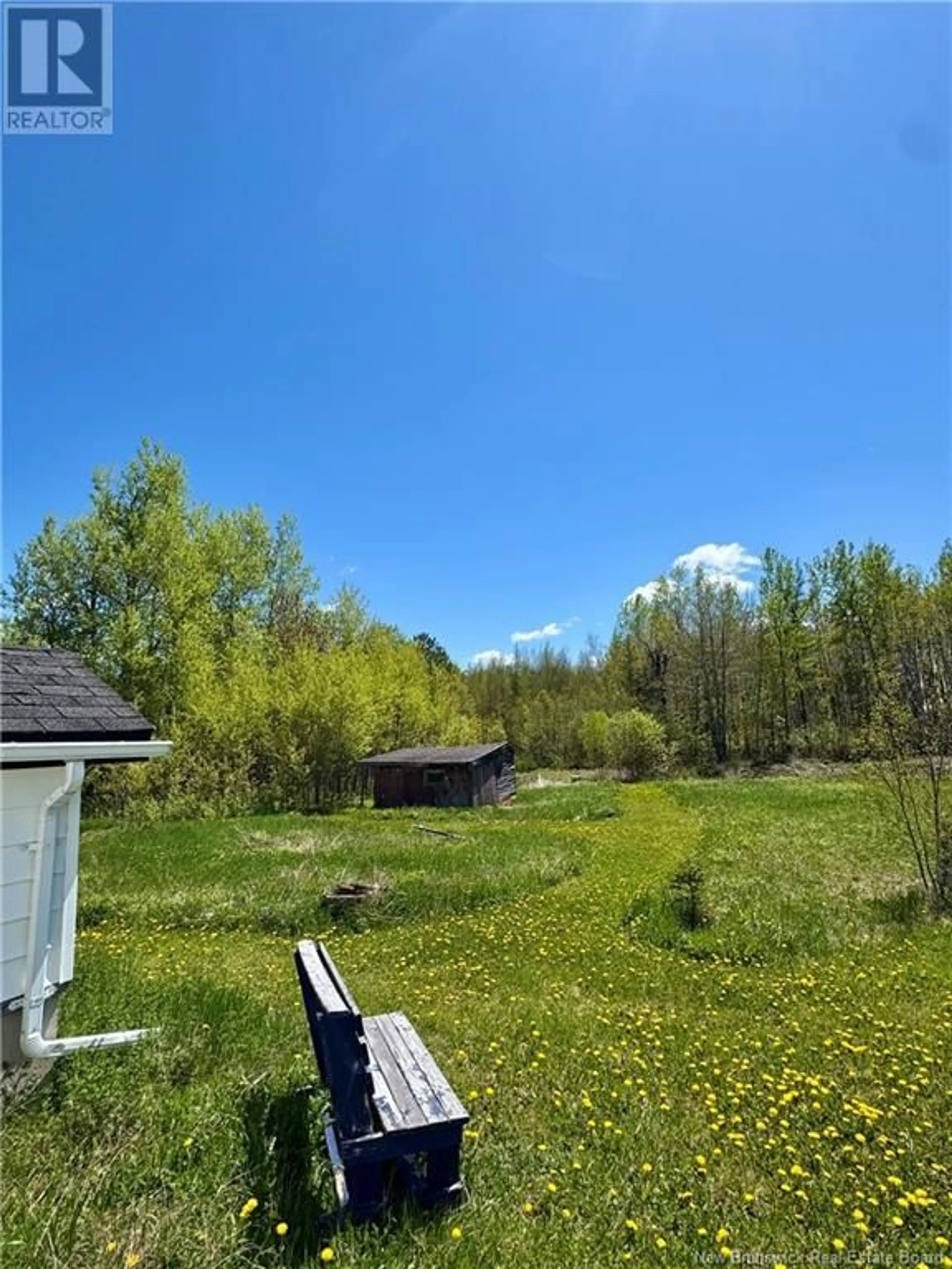 A pic from outside/outdoor area/front of a property/back of a property/a pic from drone, forest/trees view for 92 RUE DE L'ECOLE, Rogersville New Brunswick E4Y1V7