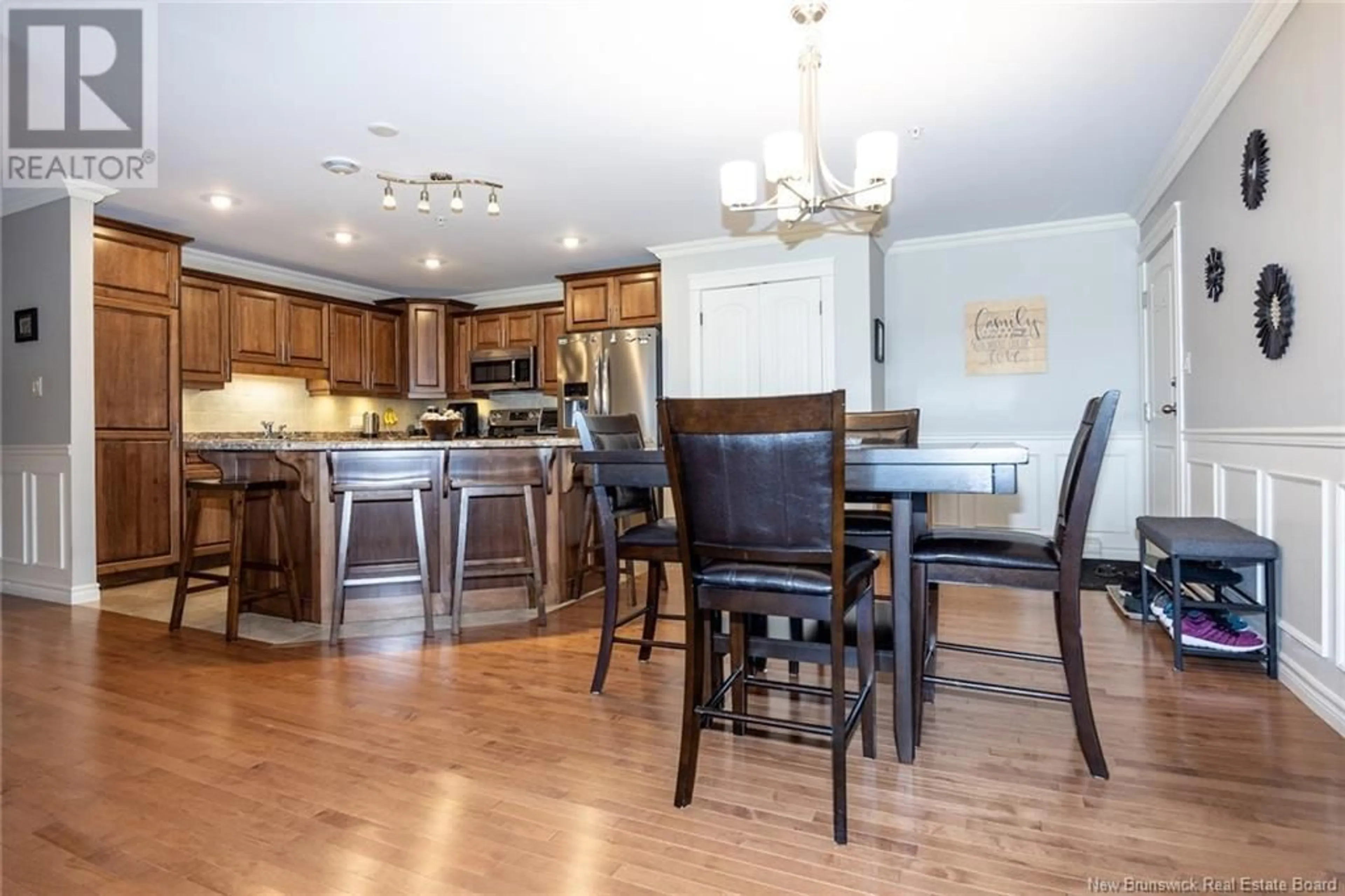 Open concept kitchen, wood/laminate floor for 211 - 155 LIAN STREET, Fredericton New Brunswick E3C1L9
