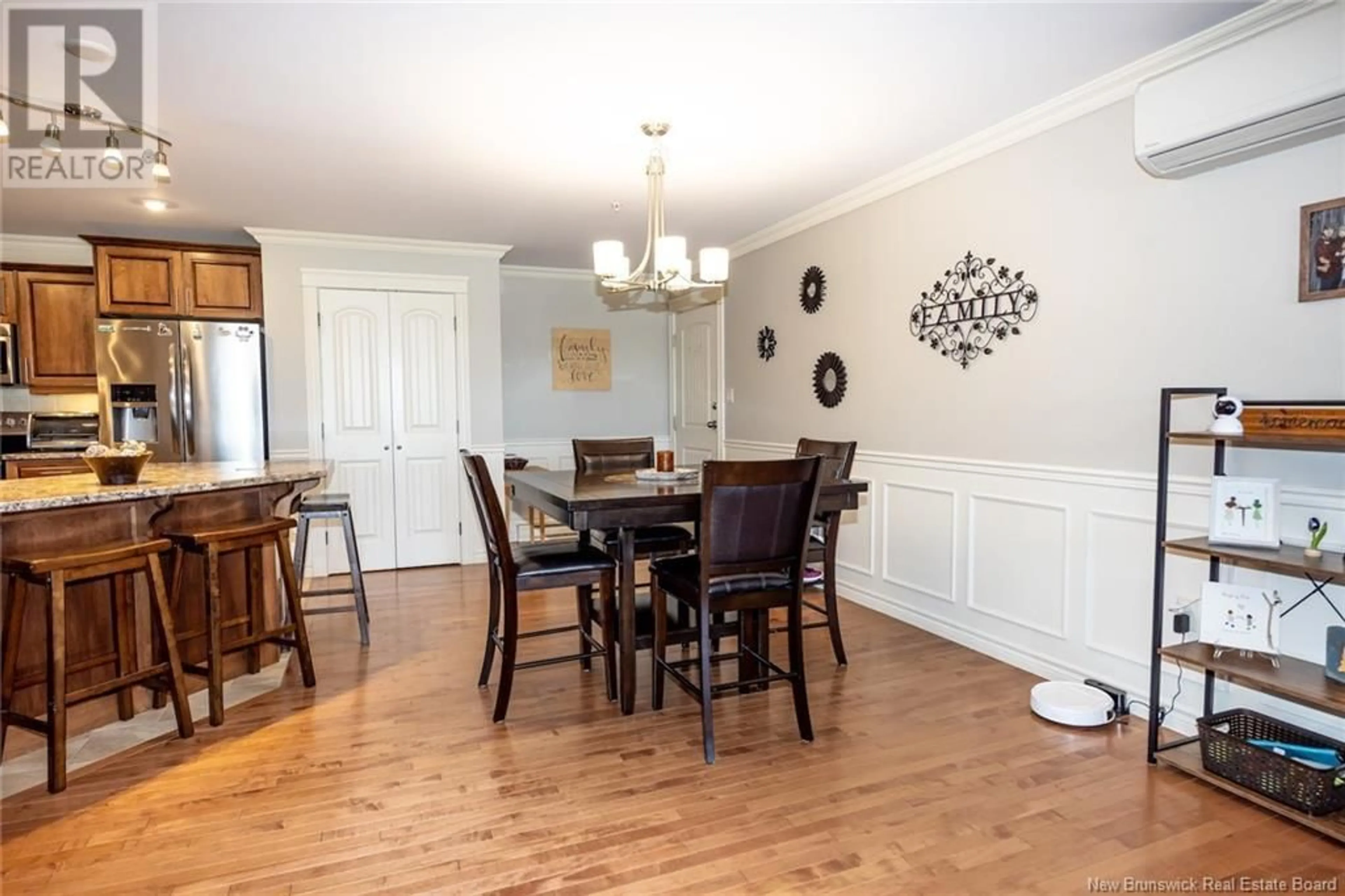 Dining room, wood/laminate floor for 211 - 155 LIAN STREET, Fredericton New Brunswick E3C1L9