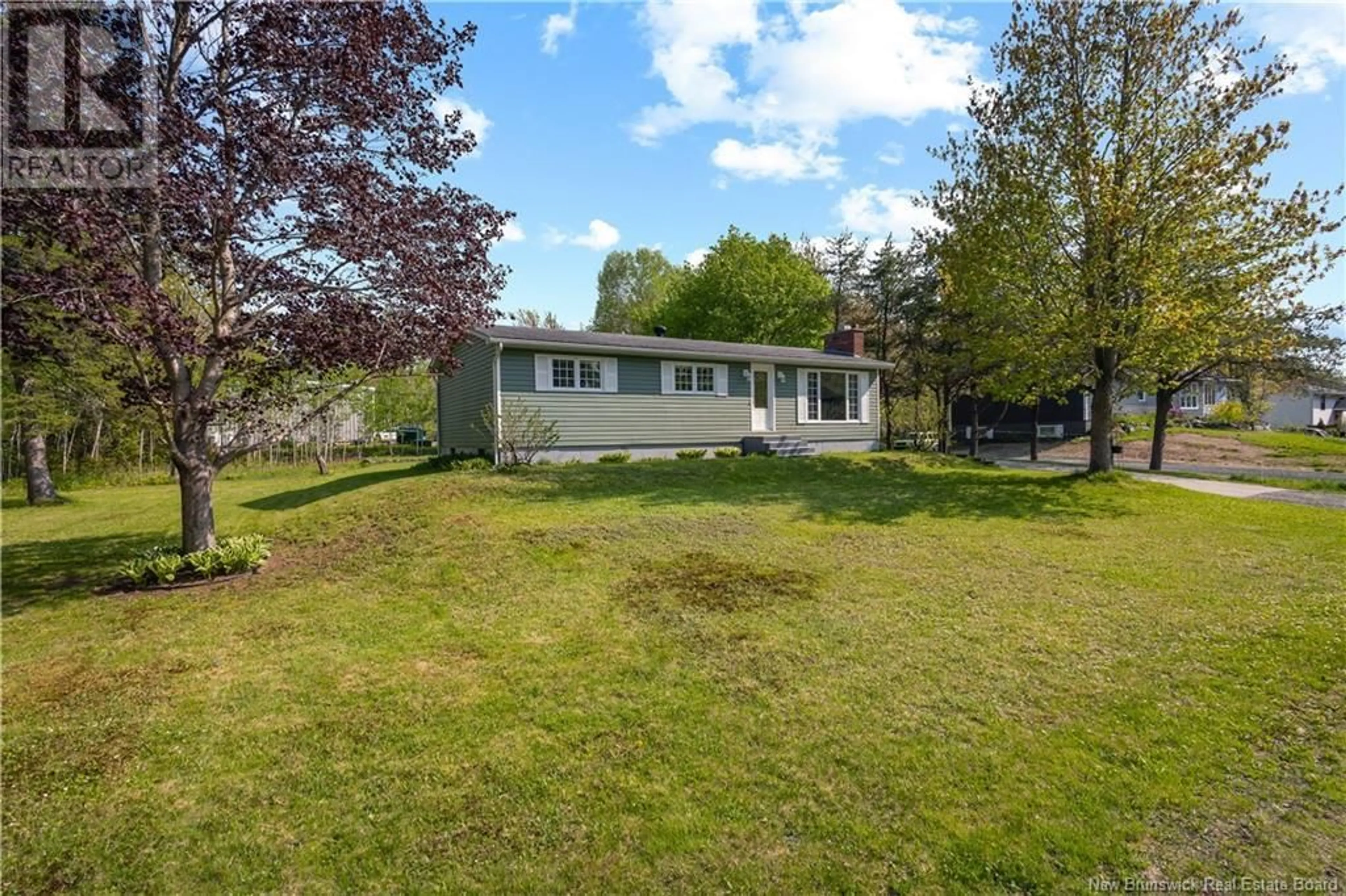 A pic from outside/outdoor area/front of a property/back of a property/a pic from drone, water/lake/river/ocean view for 232 GERALYN DRIVE, Miramichi New Brunswick E1N3T9
