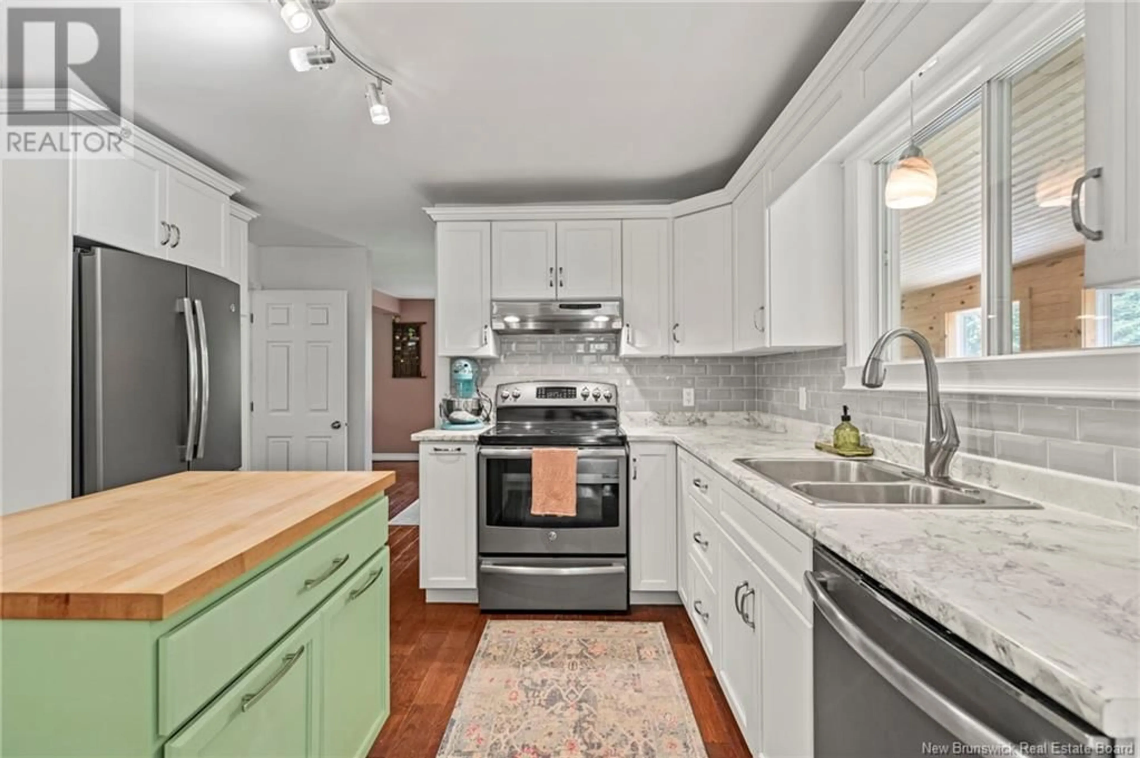 Open concept kitchen, ceramic/tile floor for 3485 WOODSTOCK ROAD, Fredericton New Brunswick E3E1A5