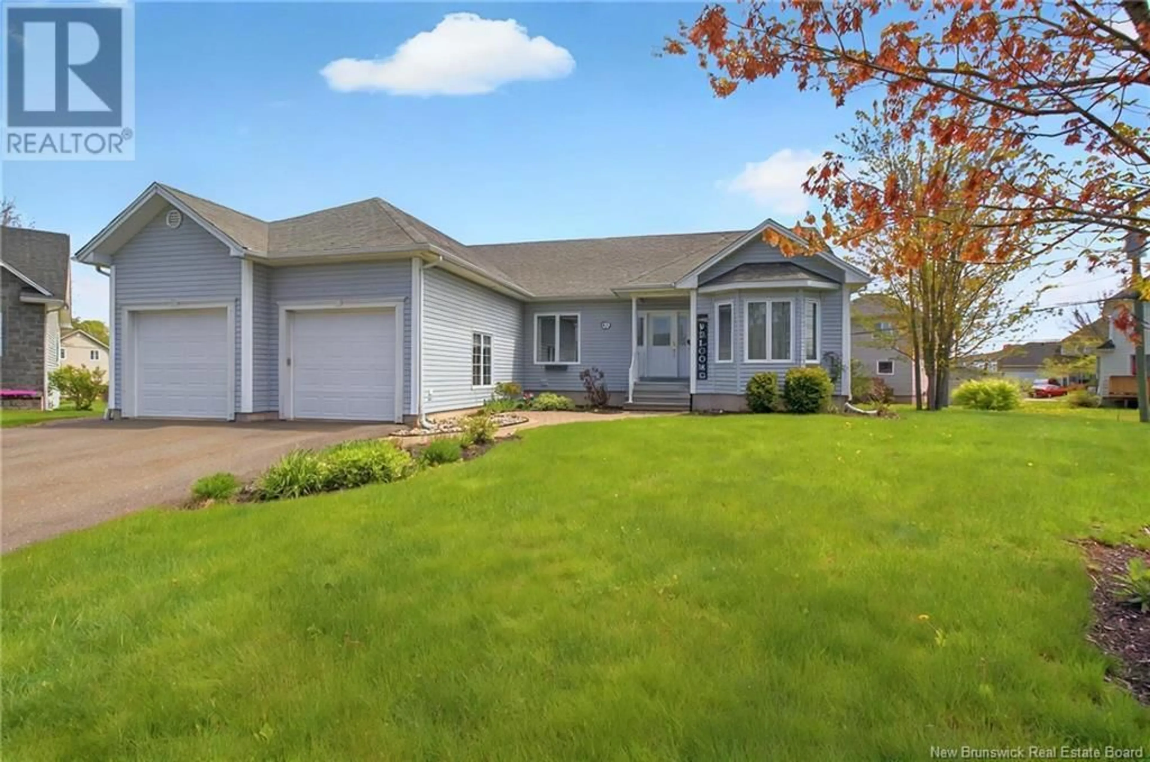 Home with vinyl exterior material, street for 1 ACORN COURT, Moncton New Brunswick E1G4X9