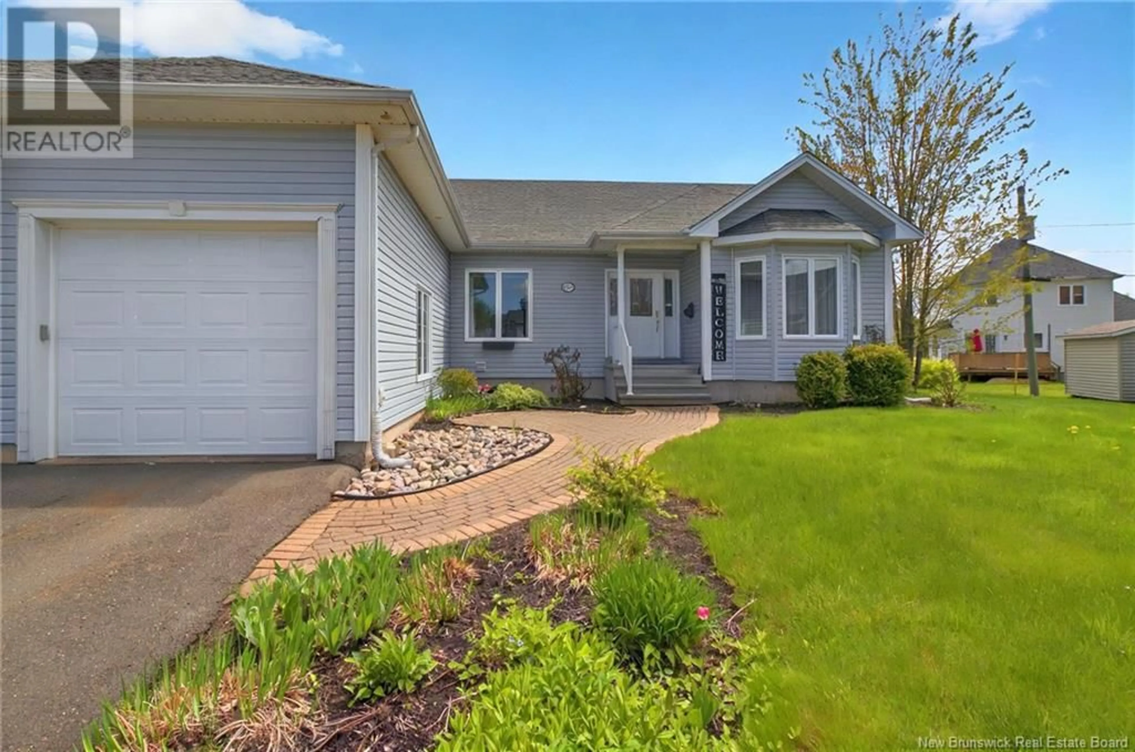 Home with vinyl exterior material, street for 1 ACORN COURT, Moncton New Brunswick E1G4X9