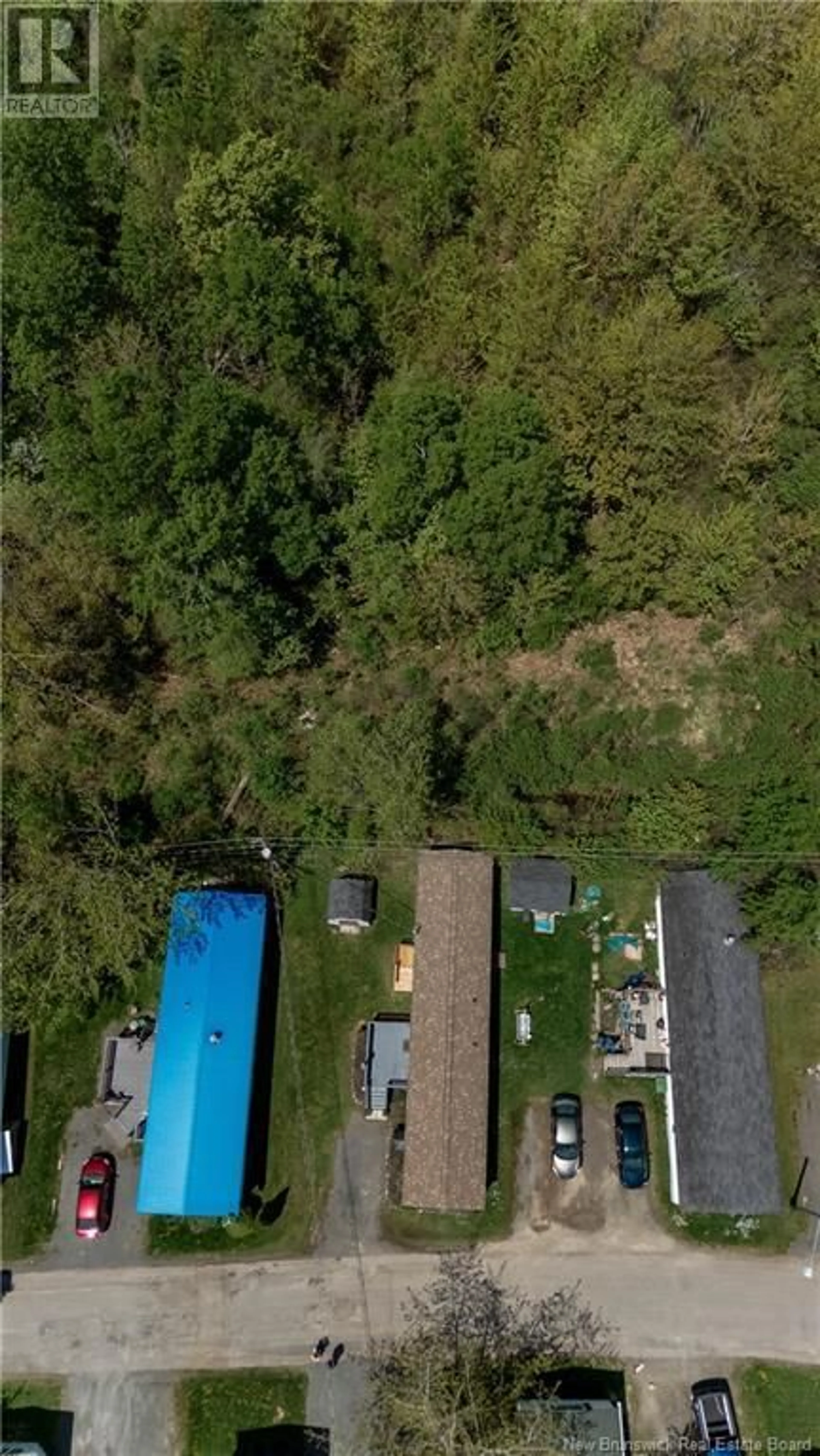 A pic from outside/outdoor area/front of a property/back of a property/a pic from drone, unknown for 60 DOUGLAS CRESCENT, New Maryland New Brunswick E3C1Y8