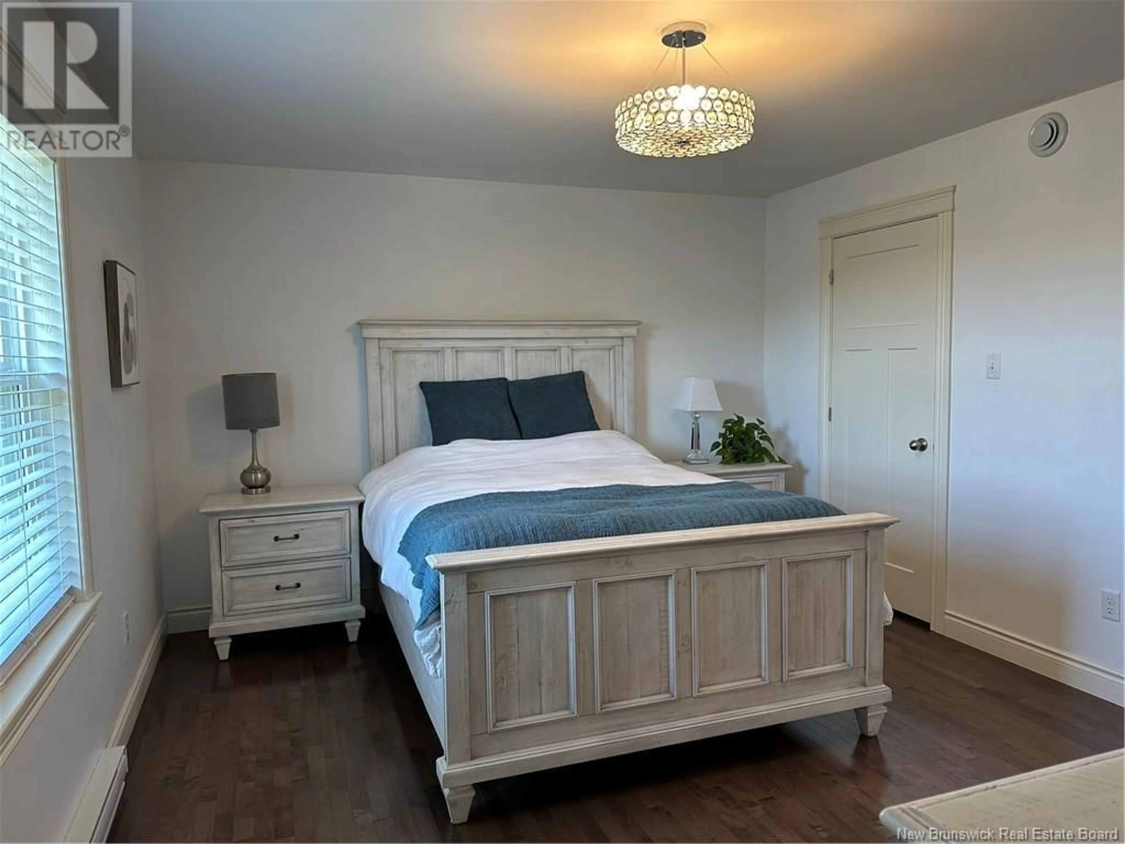 Bedroom with bed, wood/laminate floor for 90 KINGSWAY DRIVE, Quispamsis New Brunswick E2G0H7