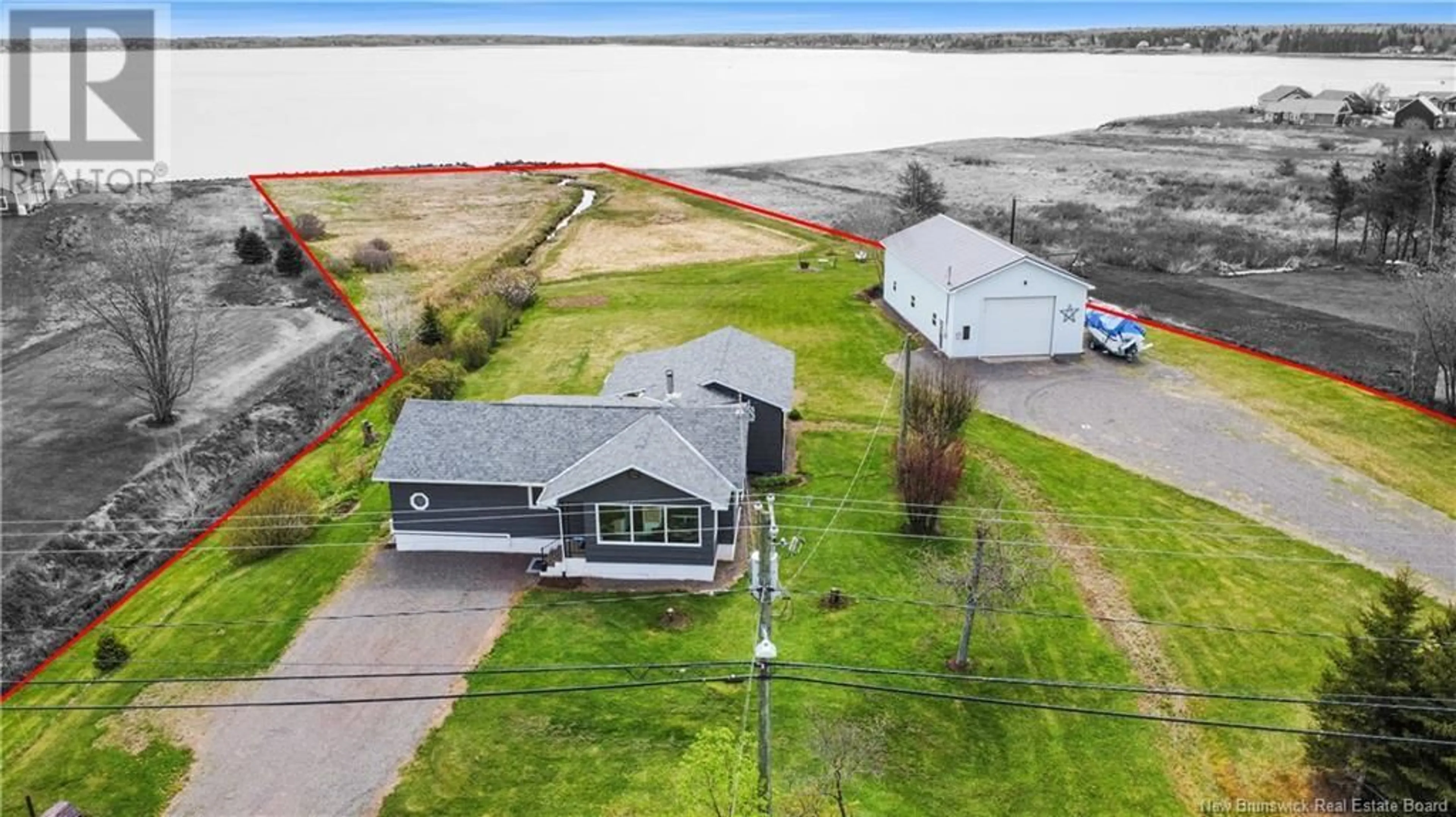 A pic from outside/outdoor area/front of a property/back of a property/a pic from drone, water/lake/river/ocean view for 1900 ROUTE 535, Cocagne New Brunswick E4R3H5