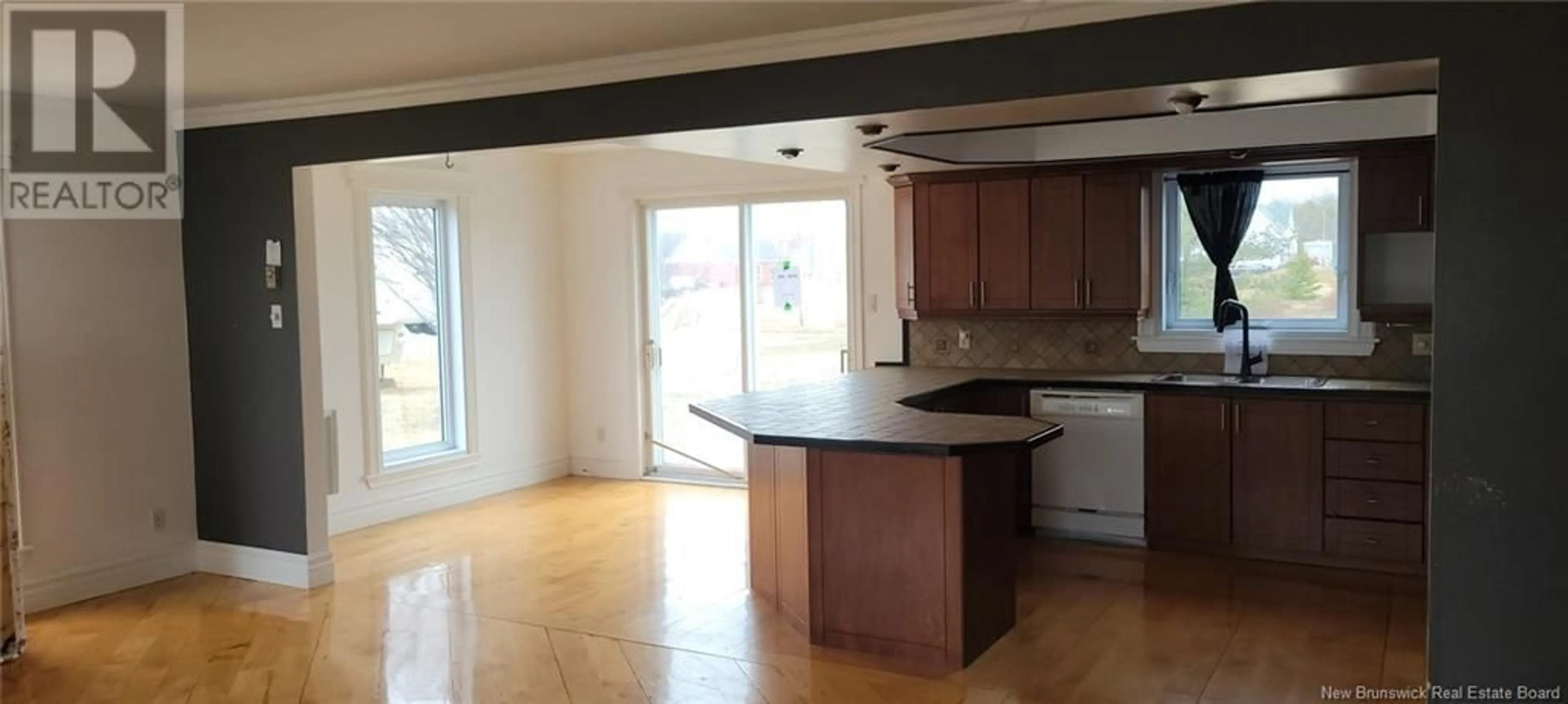 Open concept kitchen, wood/laminate floor for 3000 PAULIN STREET, Bas-Caraquet New Brunswick E1W6B6