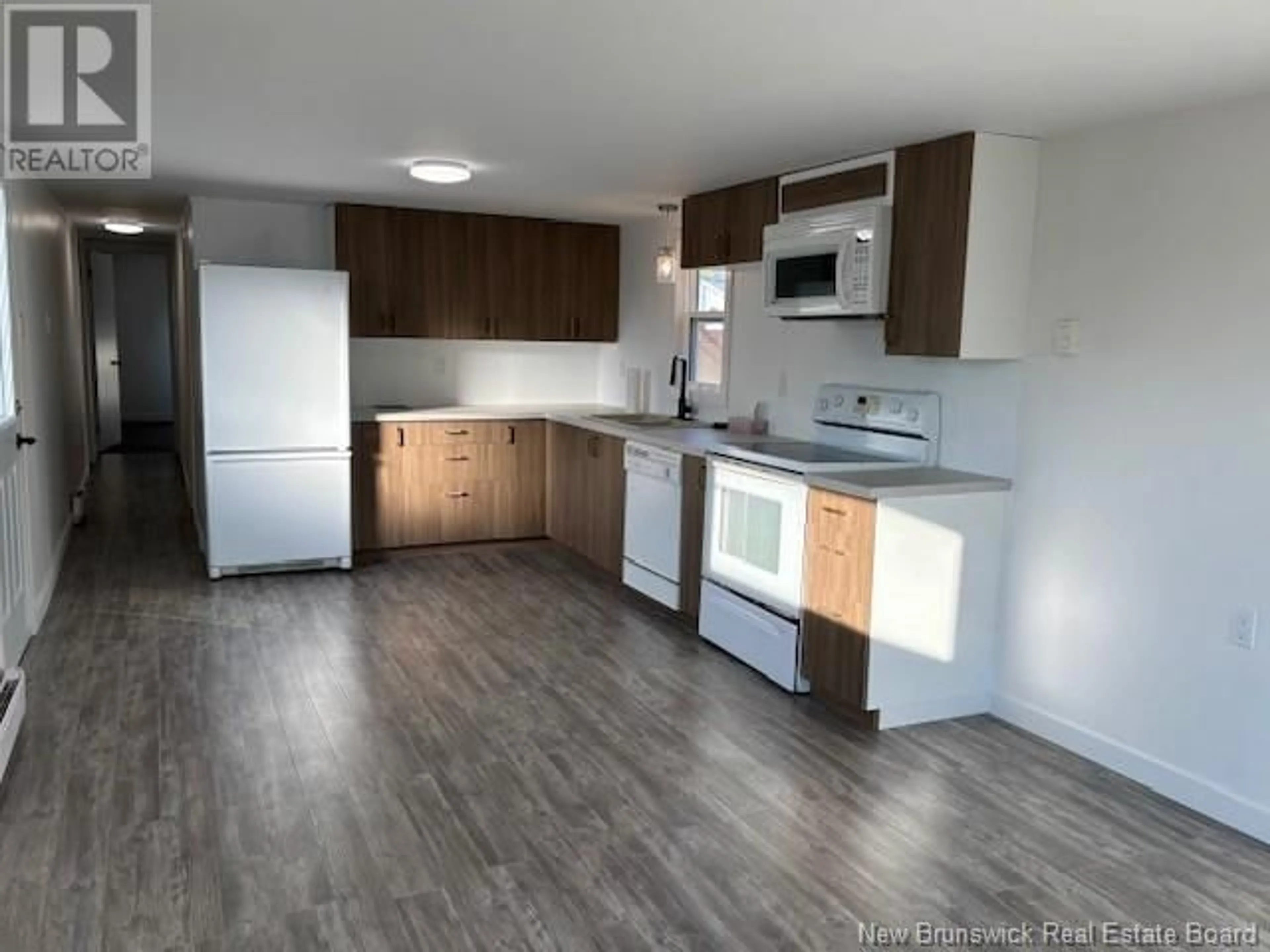 Open concept kitchen, wood/laminate floor for 12 LEE AVENUE, Sussex Corner New Brunswick E4E2W6