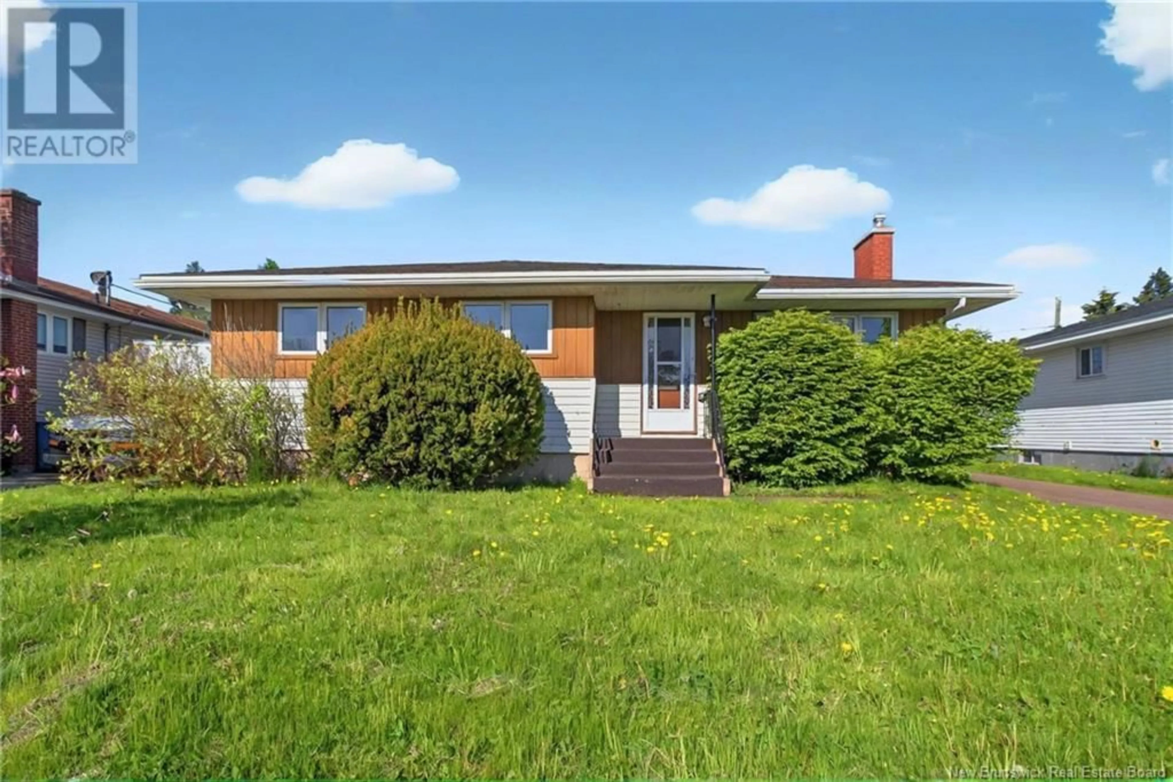 A pic from outside/outdoor area/front of a property/back of a property/a pic from drone, unknown for 50 POIRIER DRIVE, Moncton New Brunswick E1C7R8