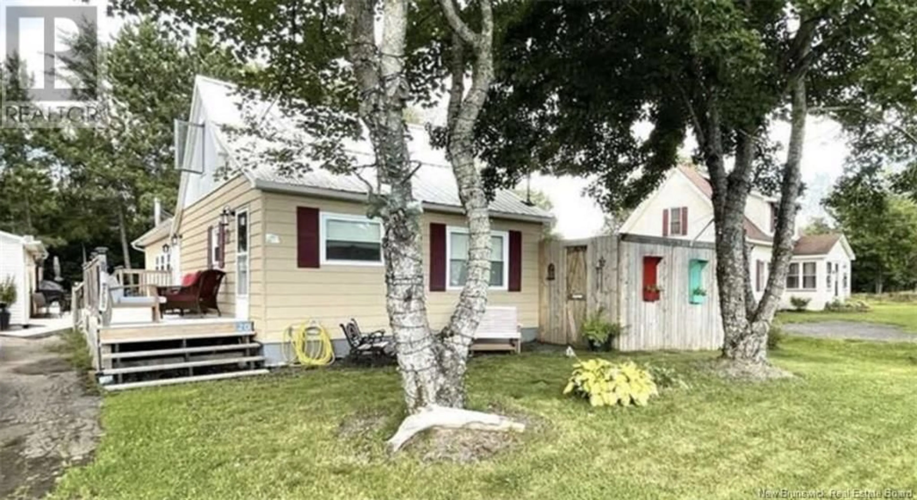 Home with vinyl exterior material, street for 20 CENTENNIAL DRIVE, Minto New Brunswick E4B3R9