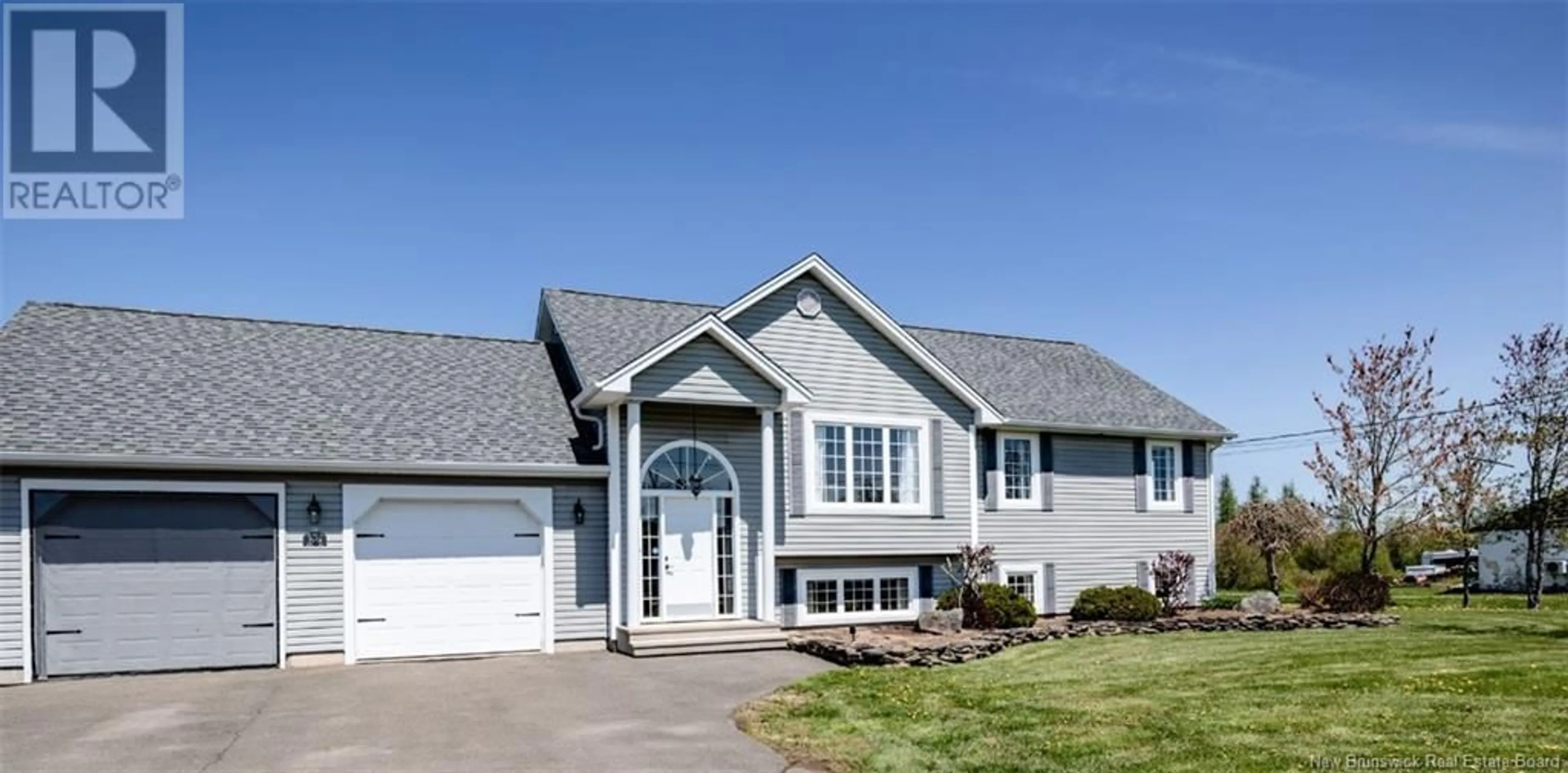 Home with vinyl exterior material, street for 59 RENAUD, Saint-Antoine New Brunswick E4V1M9