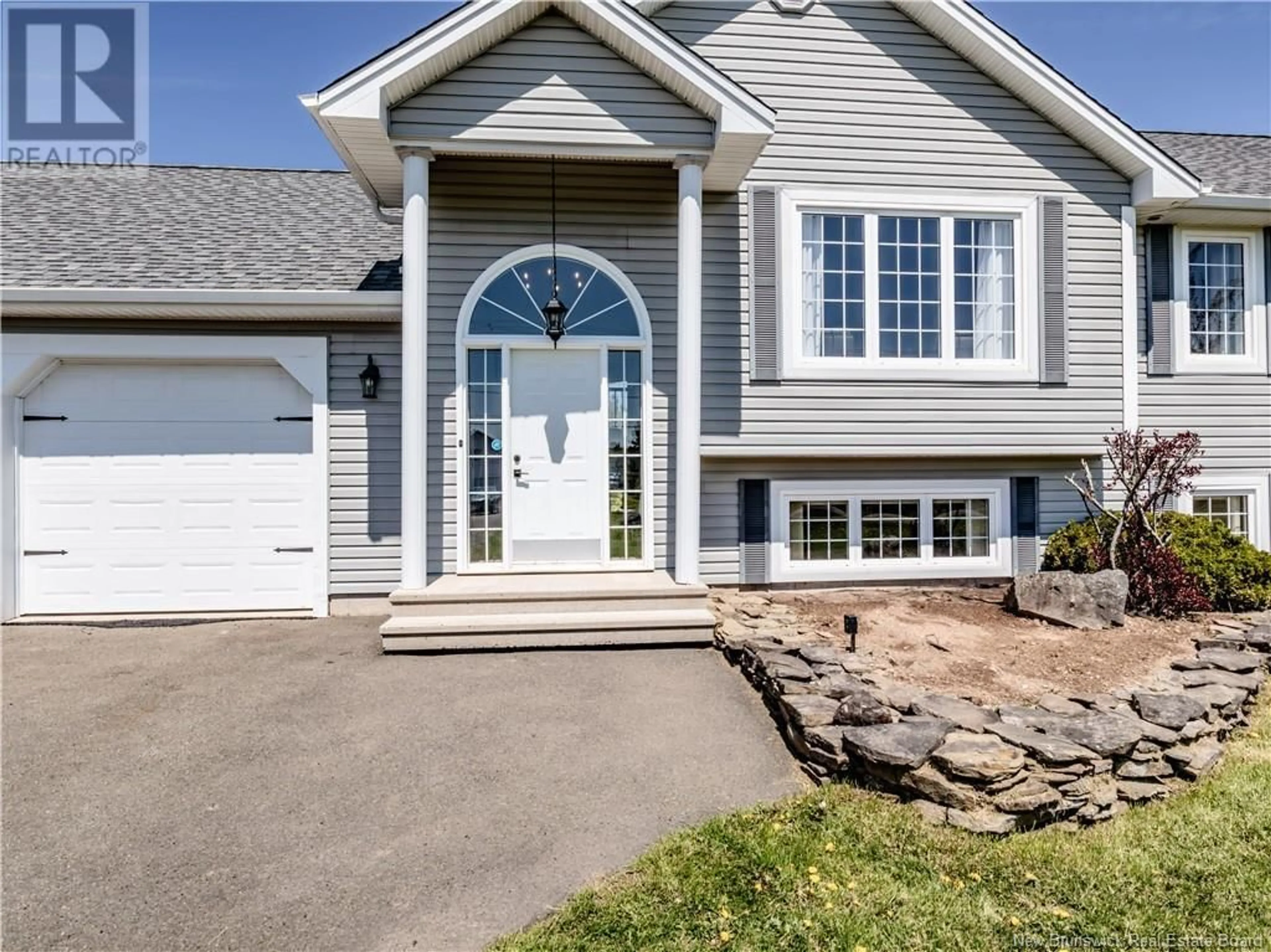 Home with vinyl exterior material, street for 59 RENAUD, Saint-Antoine New Brunswick E4V1M9