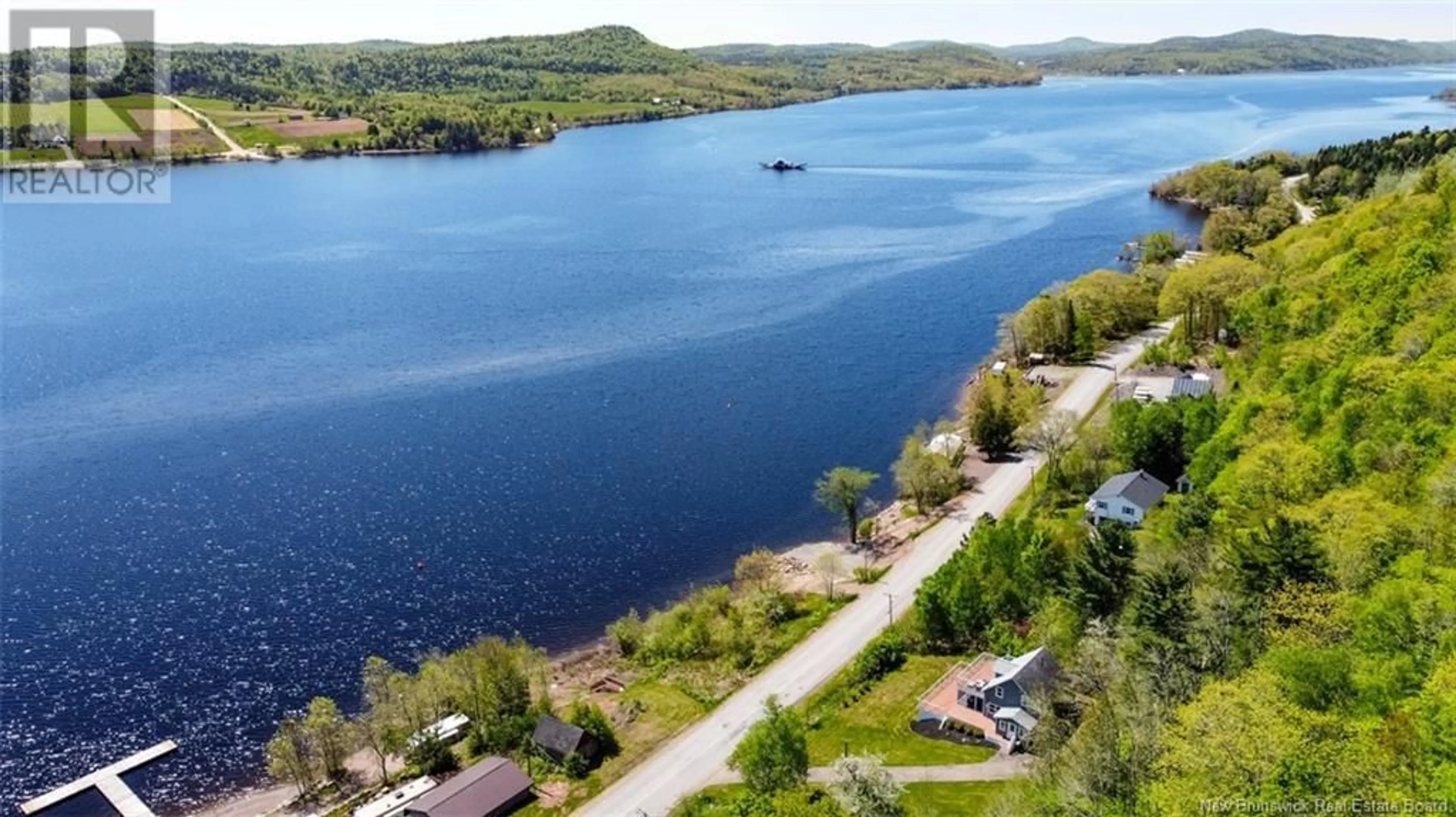 A pic from outside/outdoor area/front of a property/back of a property/a pic from drone, water/lake/river/ocean view for 2702 ROUTE 124, Kars New Brunswick E5T2W7