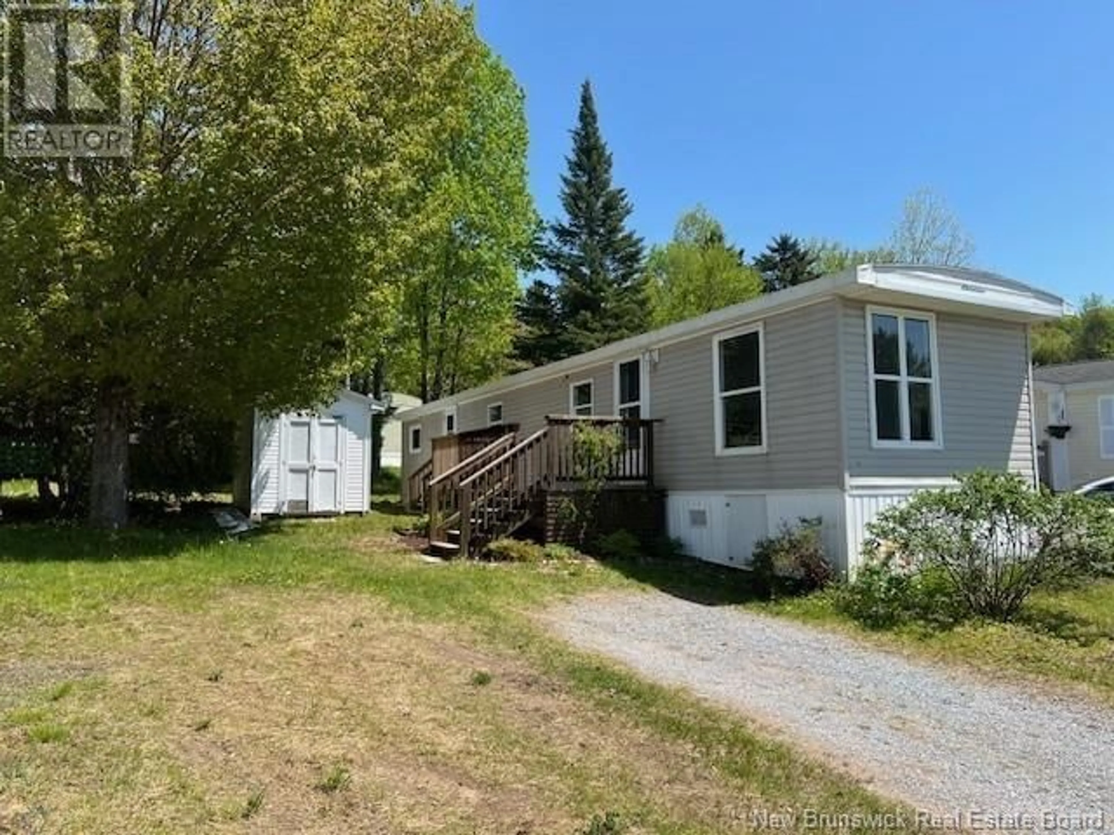 A pic from outside/outdoor area/front of a property/back of a property/a pic from drone, unknown for 132 TAMARACK LANE, Quispamsis New Brunswick E2G1T7