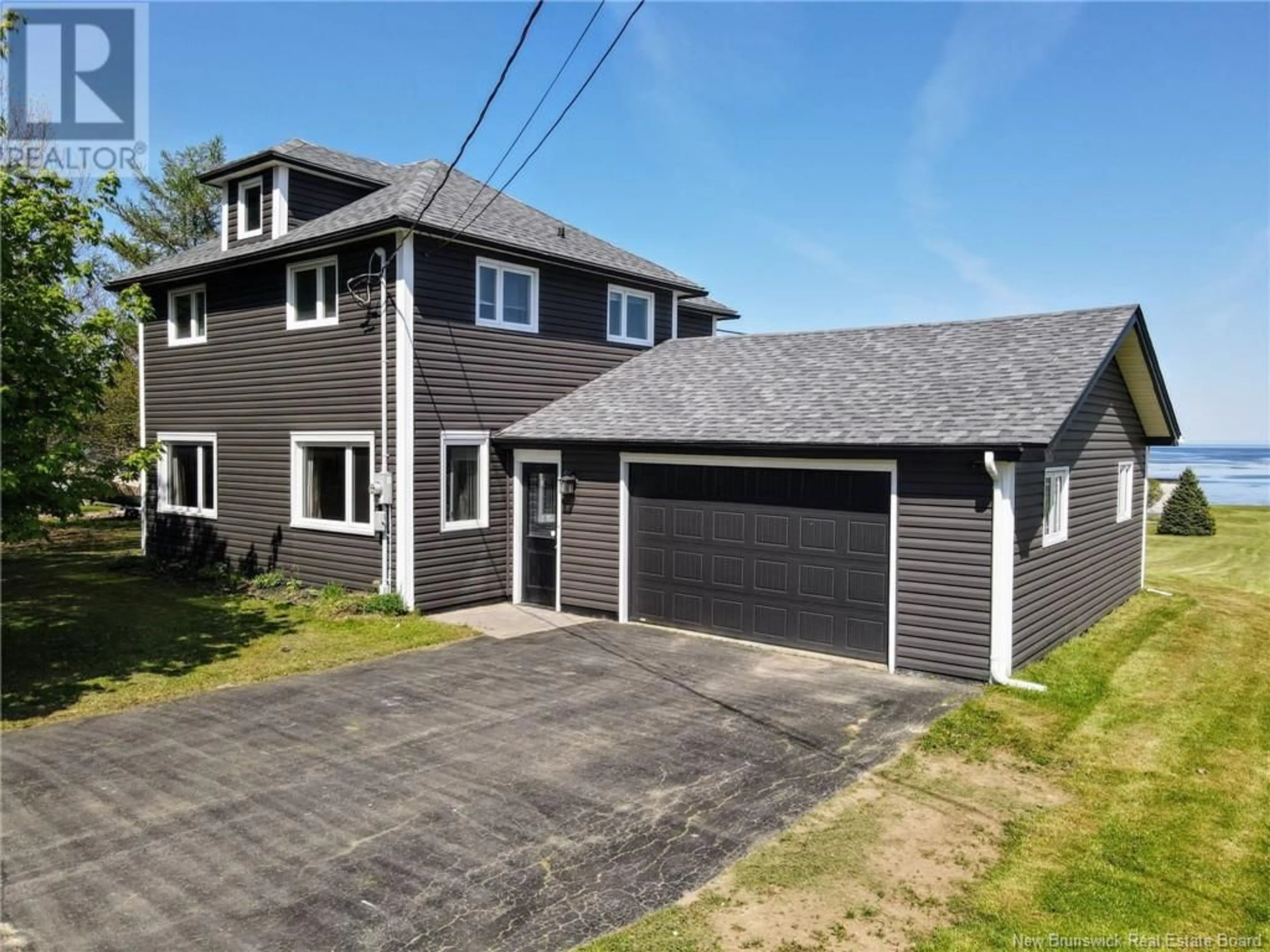 A pic from outside/outdoor area/front of a property/back of a property/a pic from drone, street for 3398 ROUTE 535, Cocagne New Brunswick E4R3K6