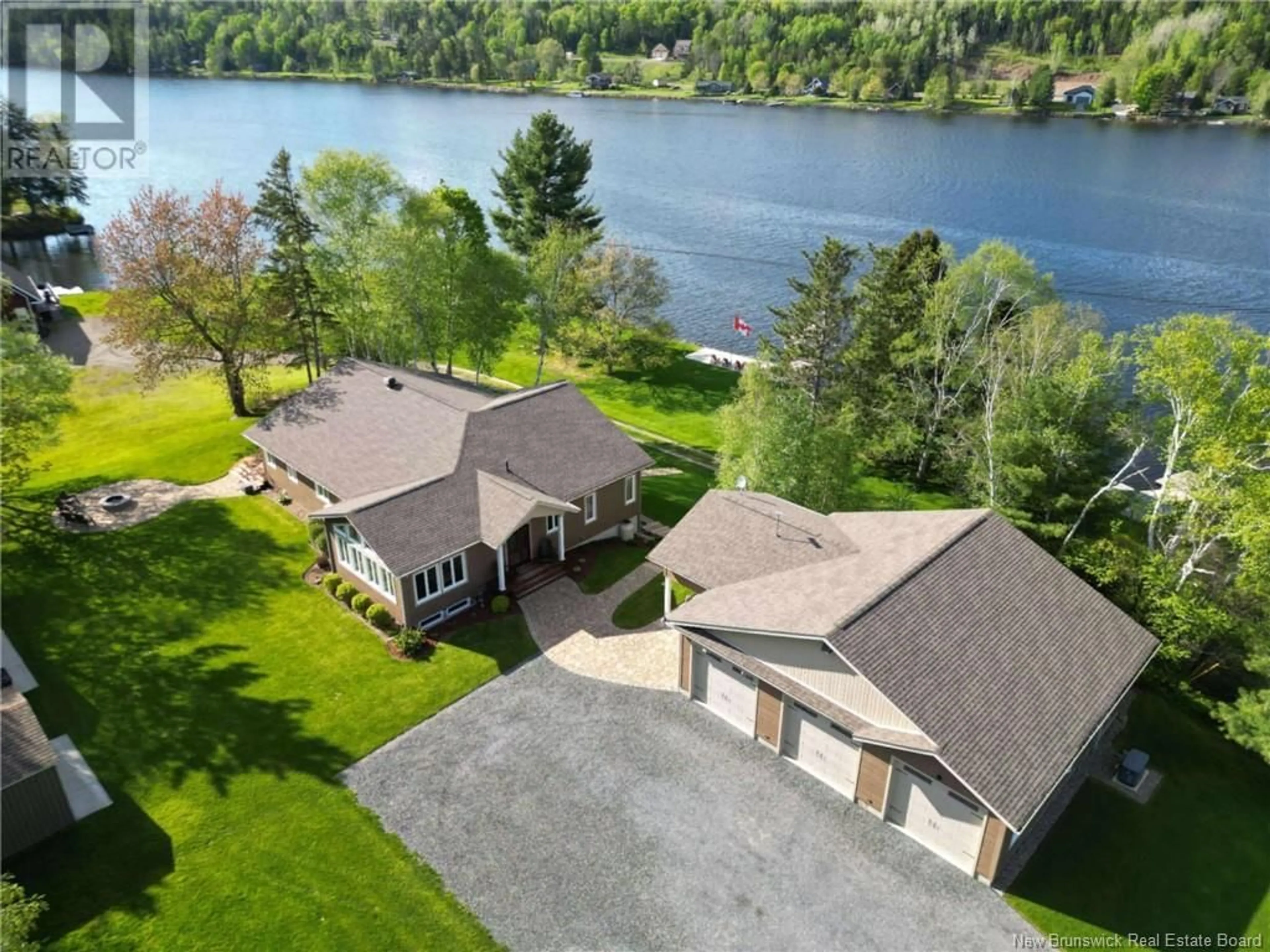 A pic from outside/outdoor area/front of a property/back of a property/a pic from drone, water/lake/river/ocean view for 19 FERRIS ROAD, Red Rapids New Brunswick E7H2A1