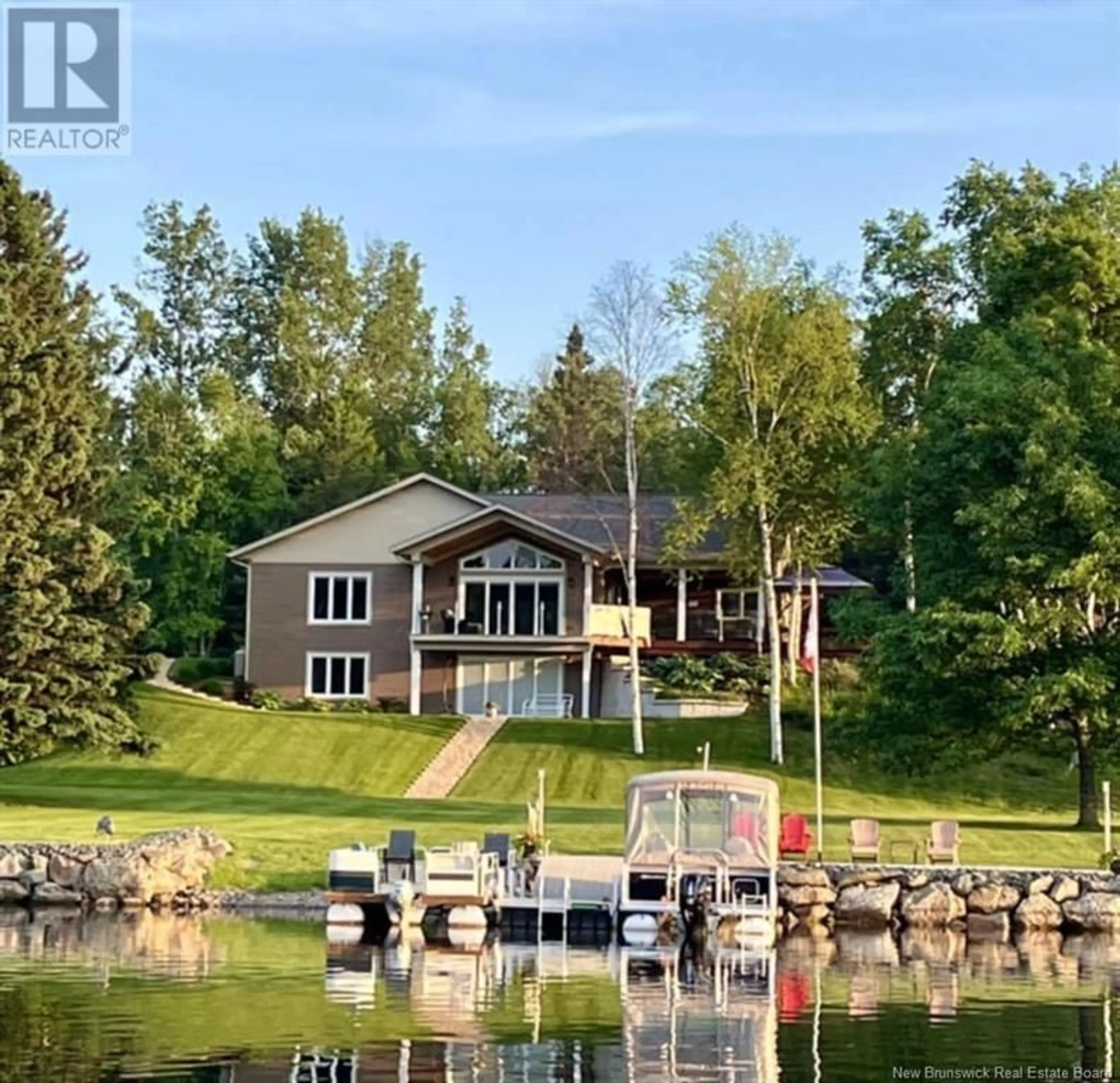 A pic from outside/outdoor area/front of a property/back of a property/a pic from drone, water/lake/river/ocean view for 19 FERRIS ROAD, Red Rapids New Brunswick E7H2A1