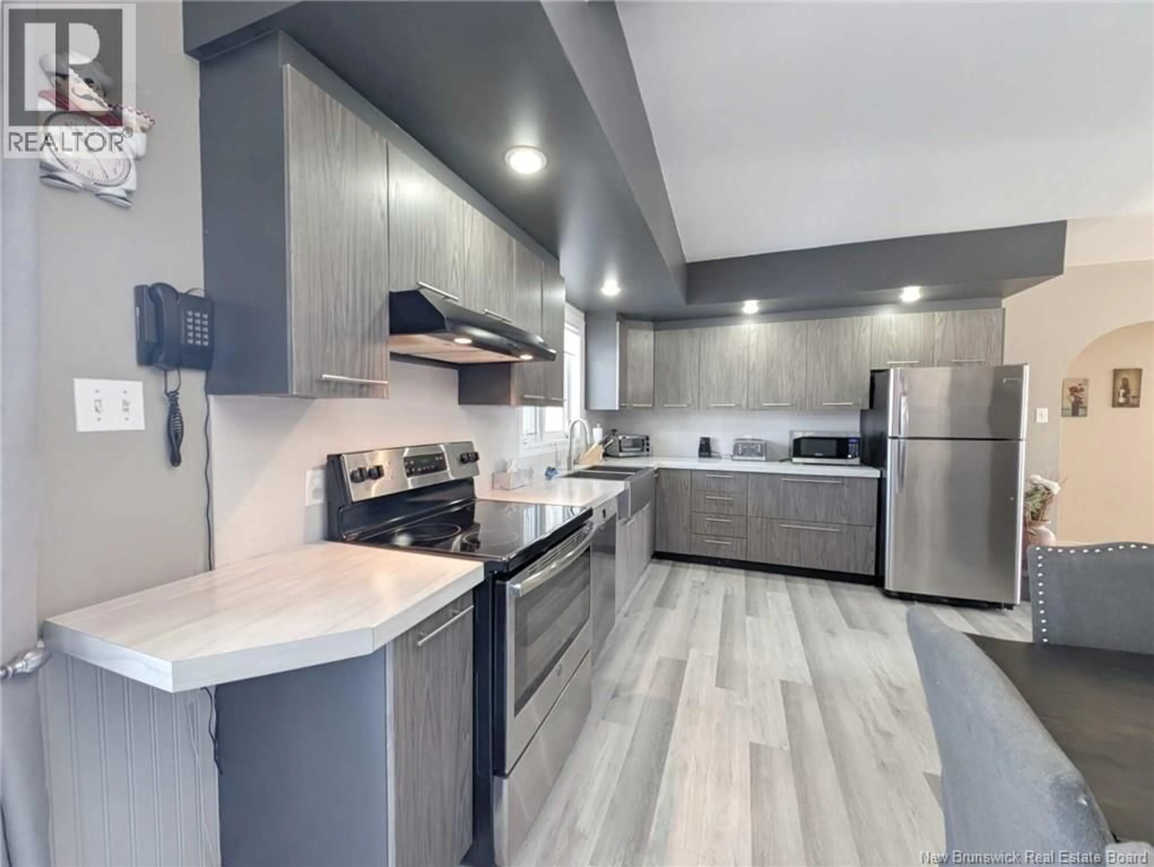 Open concept kitchen, ceramic/tile floor for 7701 DU HAVRE STREET, Bas-Caraquet New Brunswick E1W5W9