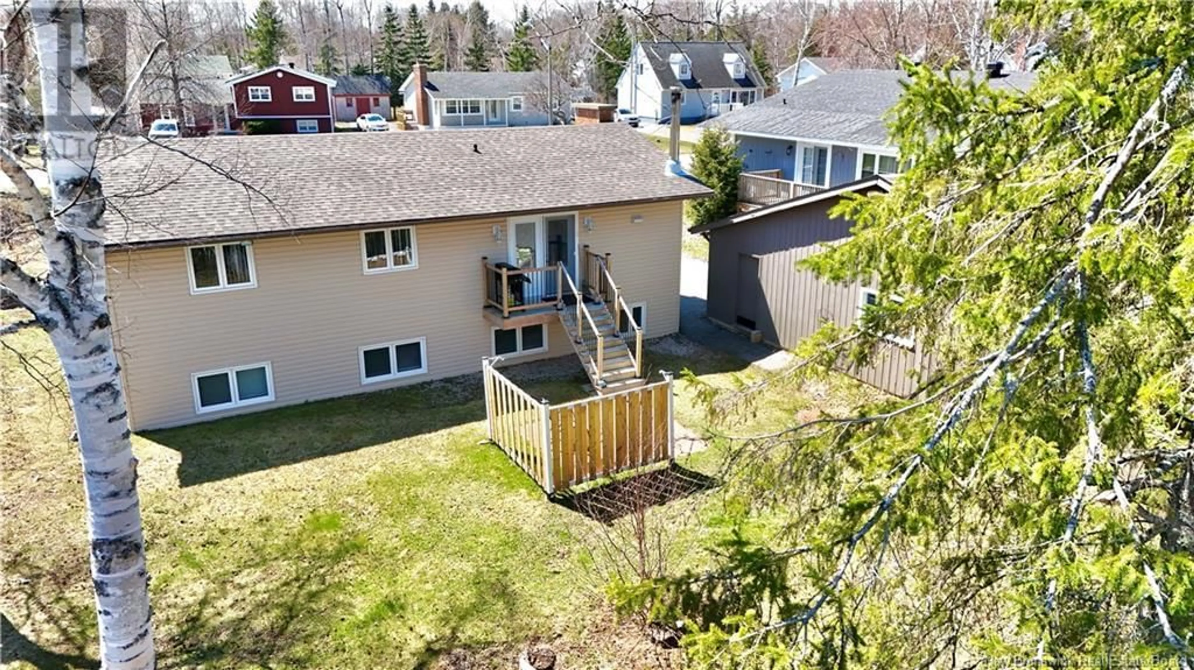 A pic from outside/outdoor area/front of a property/back of a property/a pic from drone, unknown for 920 MSGR GODIN COURT, Bathurst New Brunswick E2A4E6