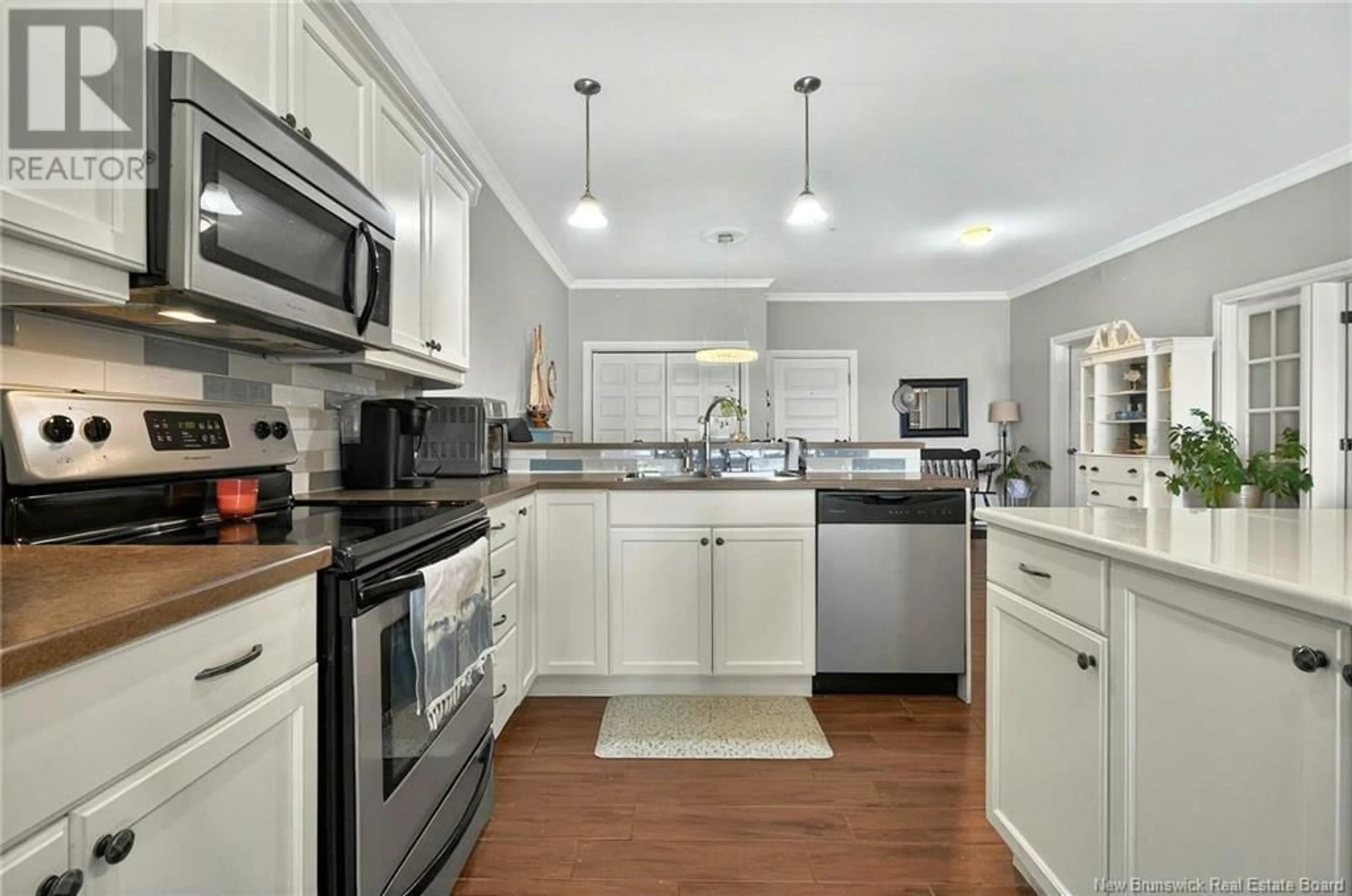 Open concept kitchen, ceramic/tile floor for 105 - 69 CAP BIMET BOULEVARD, Grand-Barachois New Brunswick E4P6X5