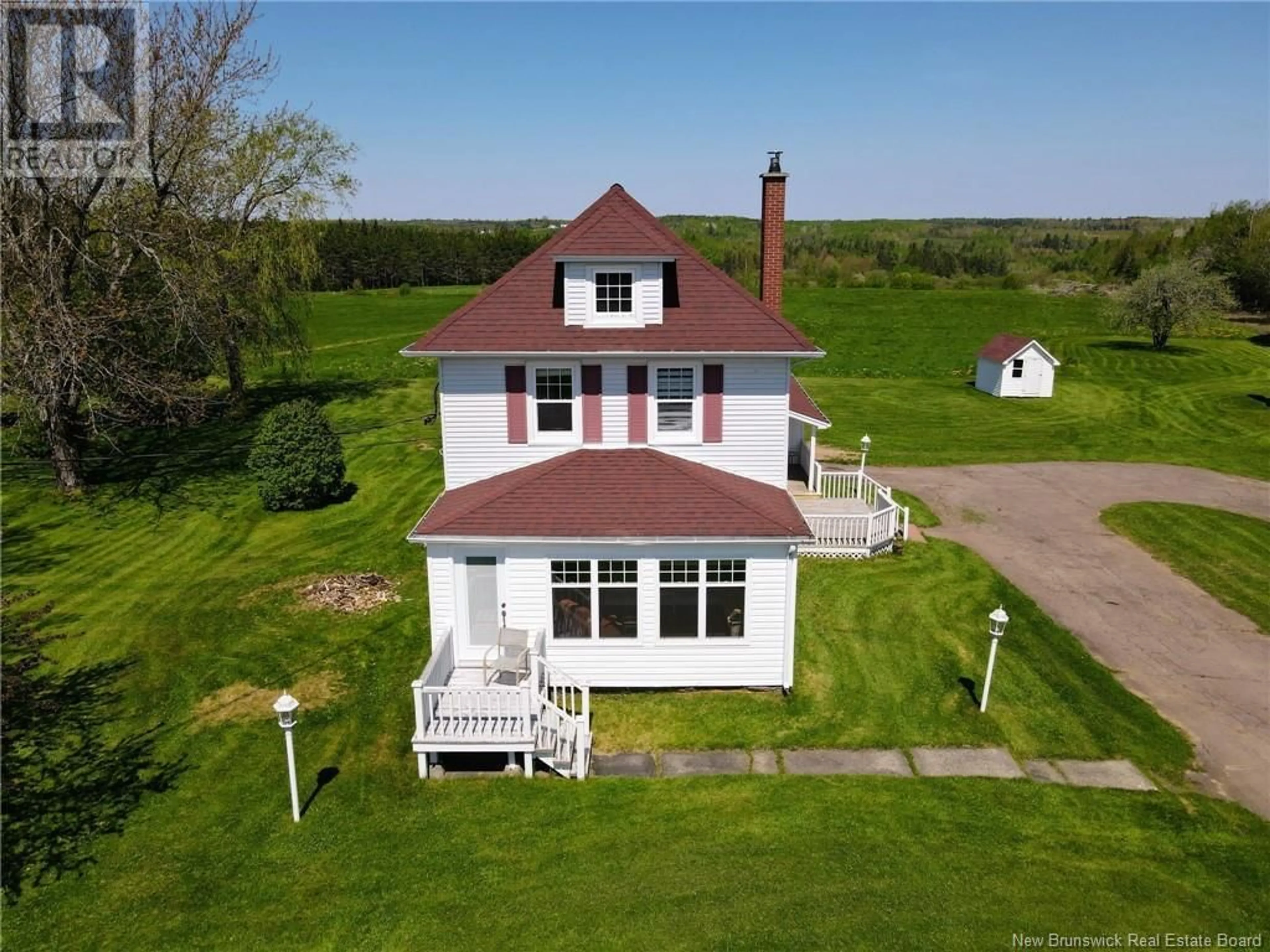A pic from outside/outdoor area/front of a property/back of a property/a pic from drone, water/lake/river/ocean view for 1823 RTE 285, Saint-Paul New Brunswick E4T3K1