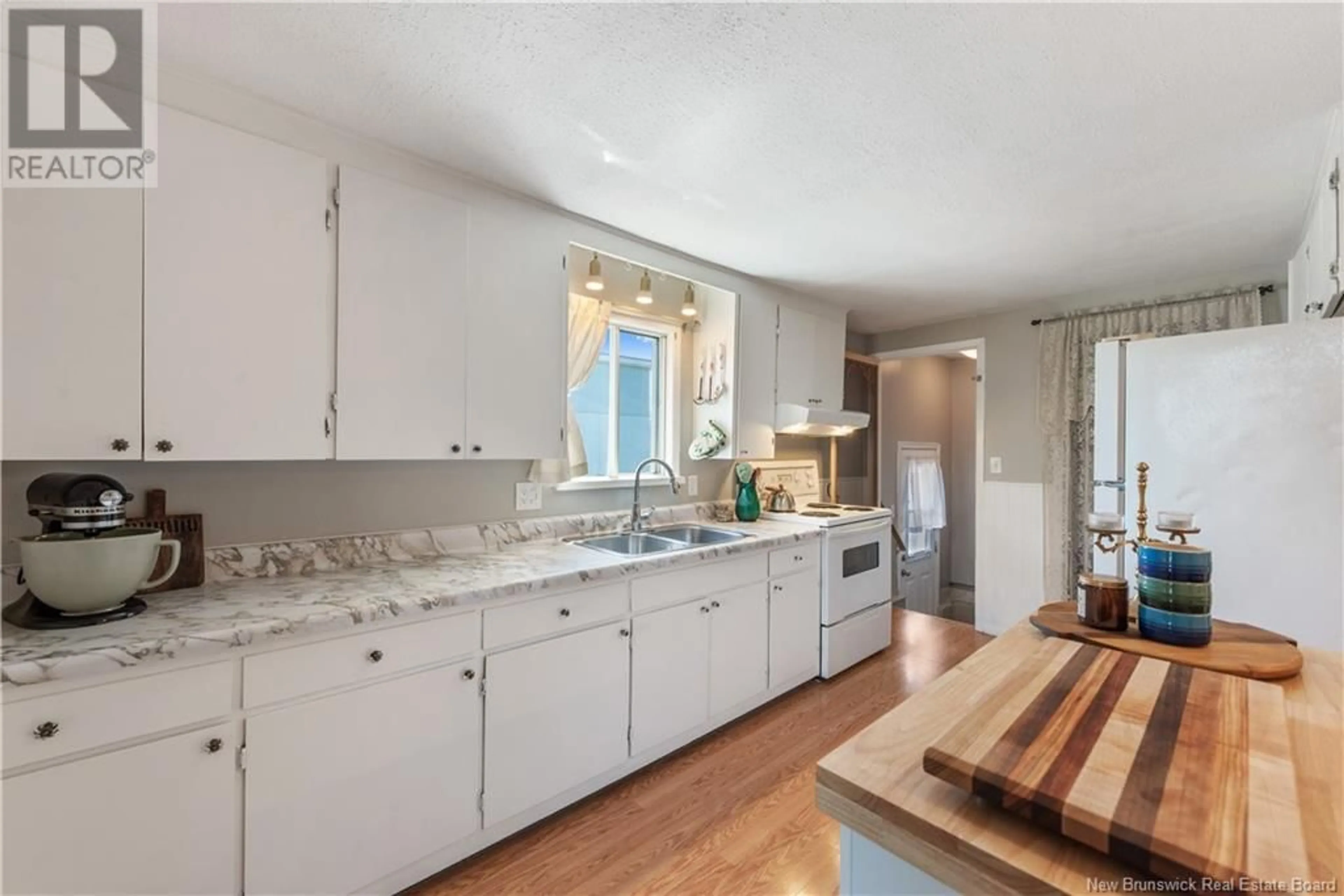 Open concept kitchen, ceramic/tile floor for 76 ATKINSON AVENUE, Moncton New Brunswick E1C7S5