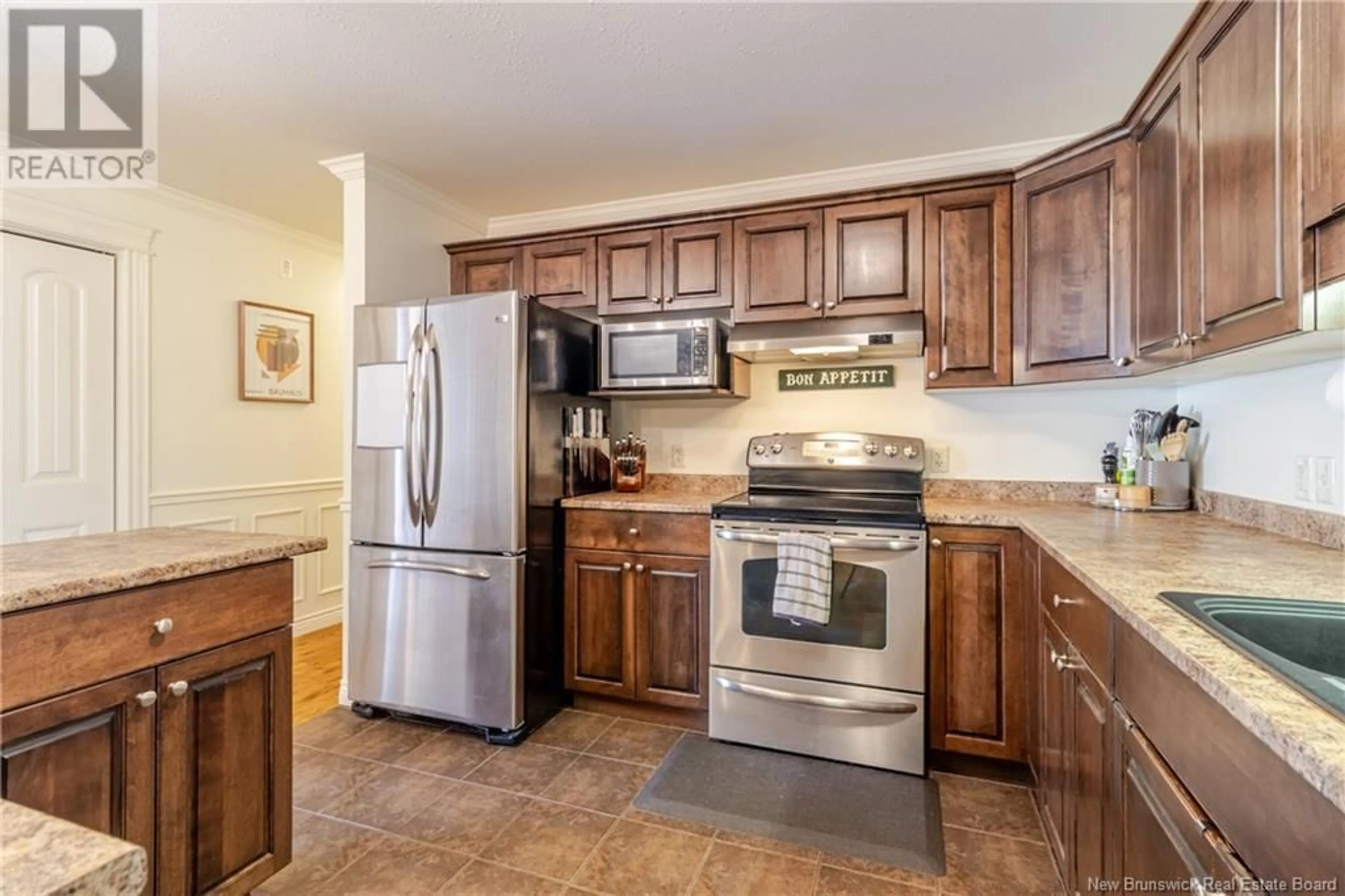 Standard kitchen, ceramic/tile floor for 103 - 130 LIAN STREET, Fredericton New Brunswick E3C0G4