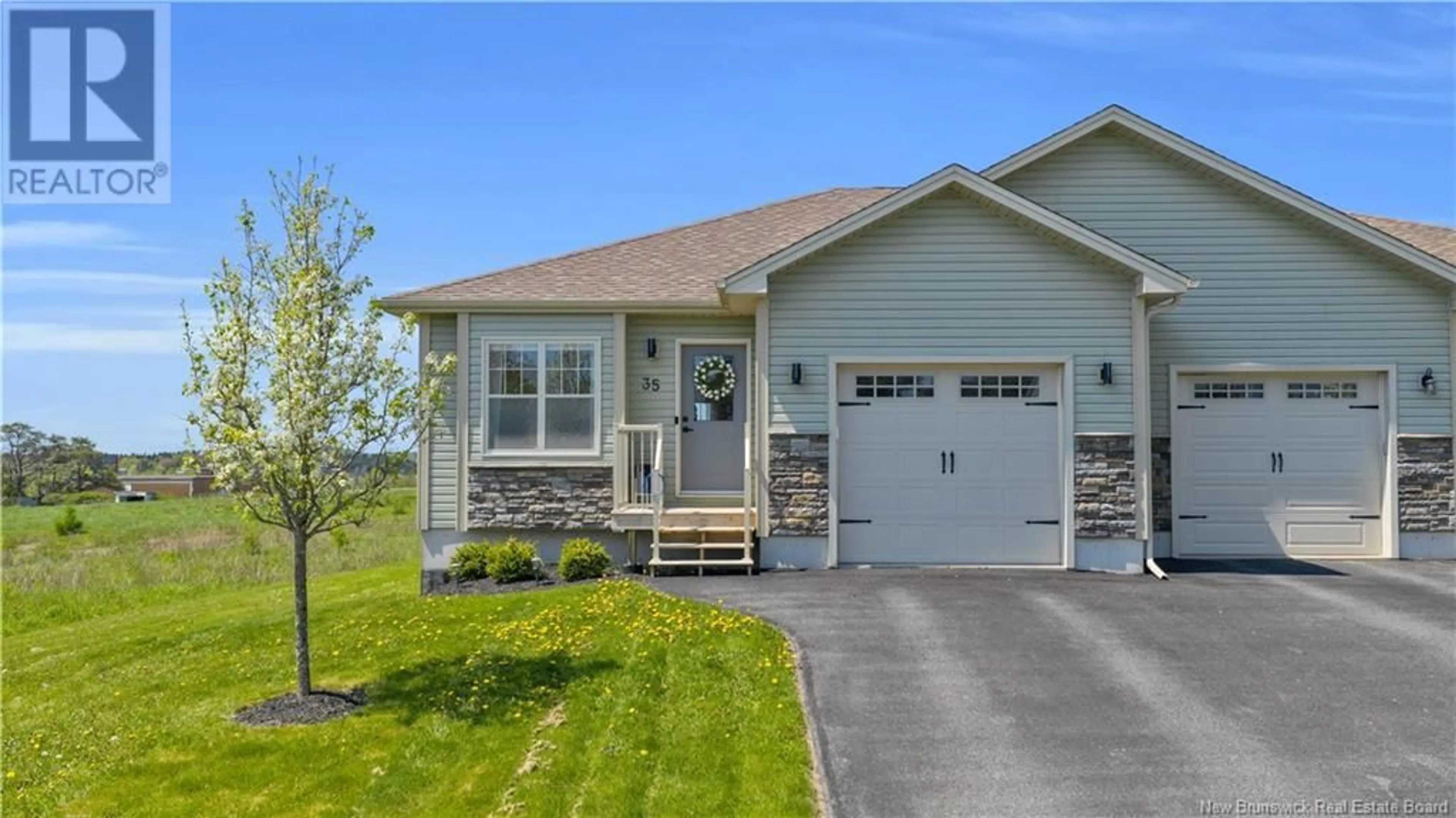 Home with vinyl exterior material, street for 35 MOSAIC DRIVE, Saint John New Brunswick E2J0K1
