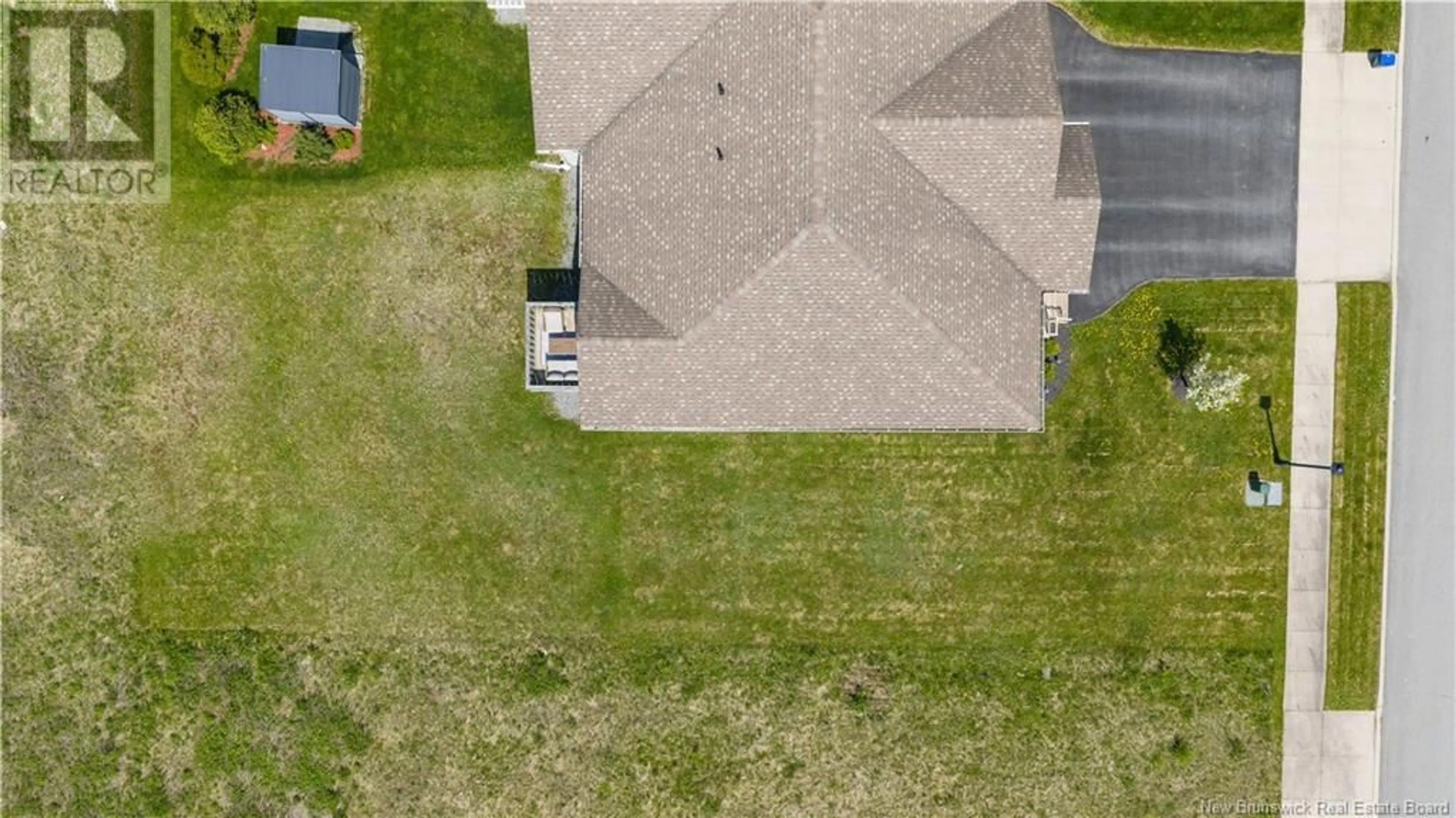 A pic from outside/outdoor area/front of a property/back of a property/a pic from drone, street for 35 MOSAIC DRIVE, Saint John New Brunswick E2J0K1