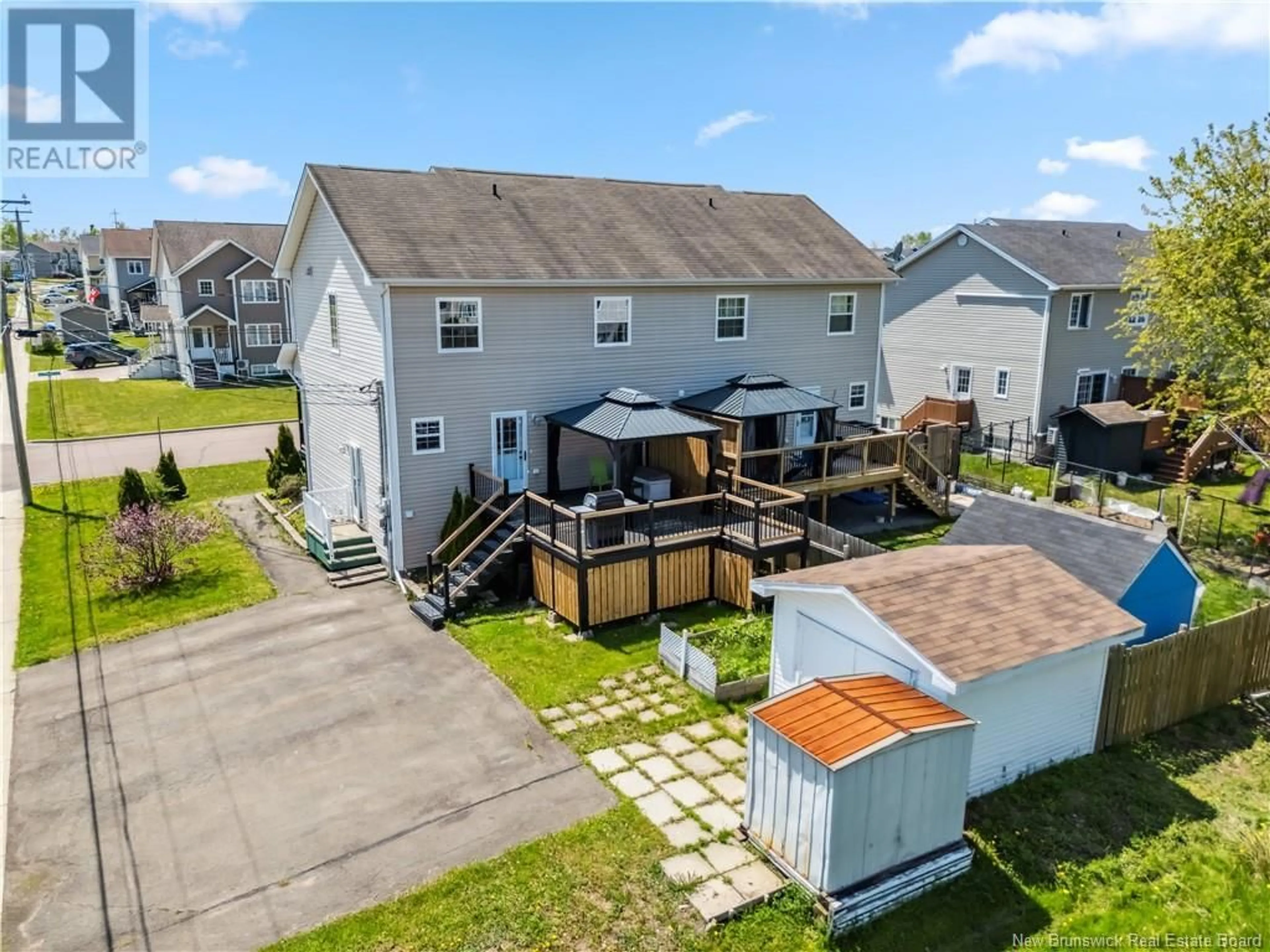 A pic from outside/outdoor area/front of a property/back of a property/a pic from drone, water/lake/river/ocean view for 3 TRELLIS COURT, Moncton New Brunswick E1G0G7