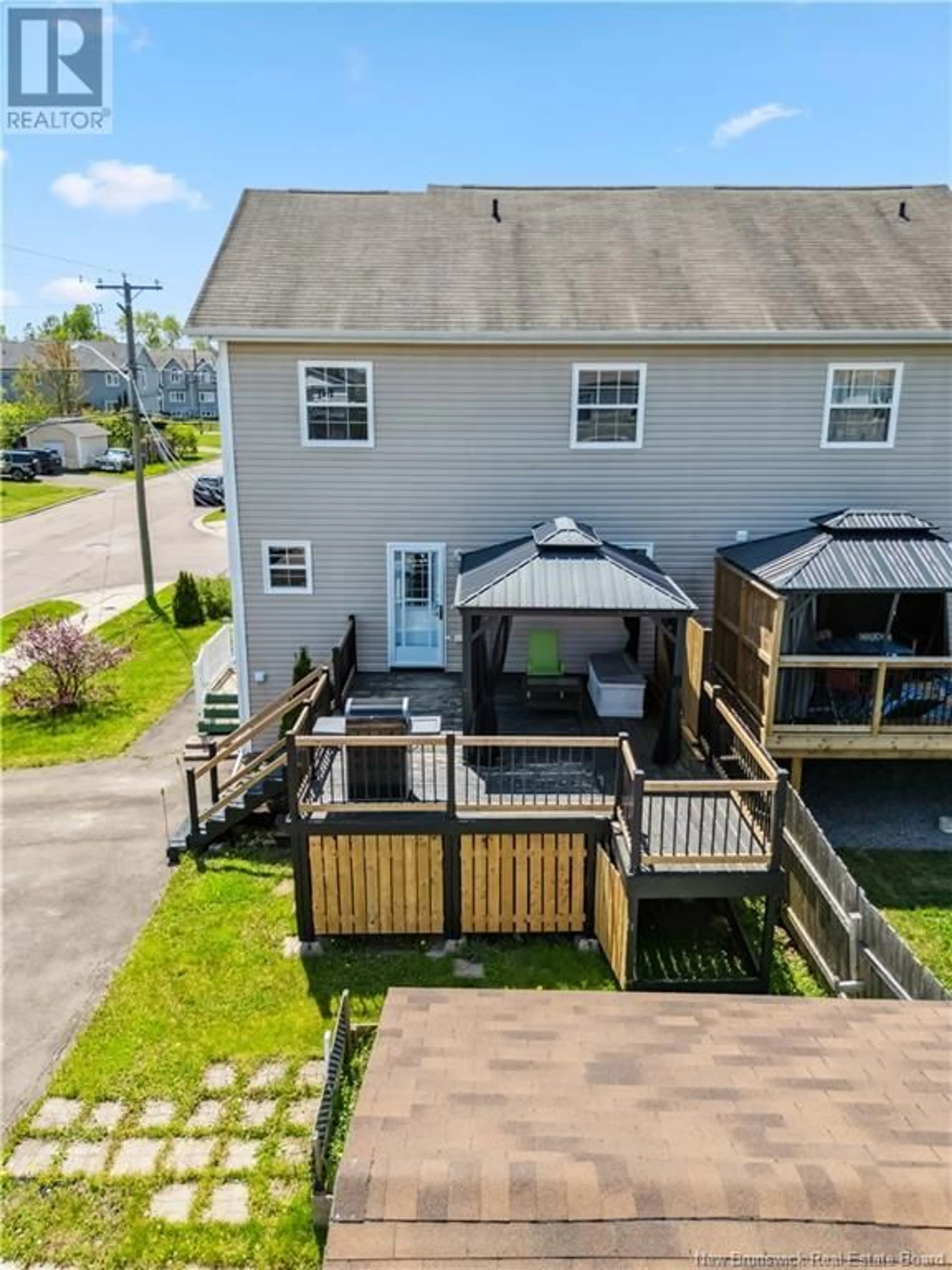 A pic from outside/outdoor area/front of a property/back of a property/a pic from drone, water/lake/river/ocean view for 3 TRELLIS COURT, Moncton New Brunswick E1G0G7
