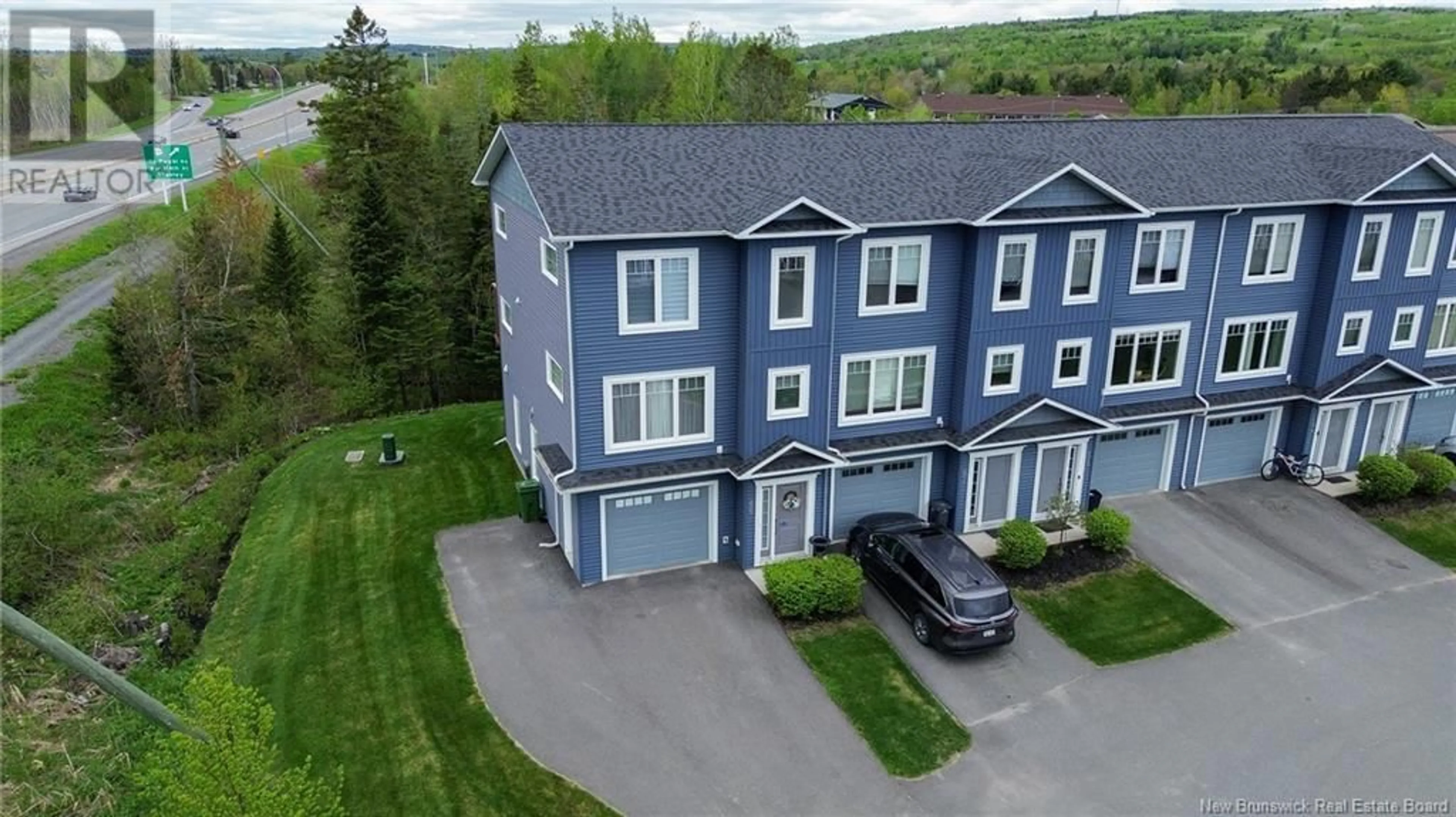 A pic from outside/outdoor area/front of a property/back of a property/a pic from drone, unknown for 66 MIA CIRCLE, Fredericton New Brunswick E3A7N5