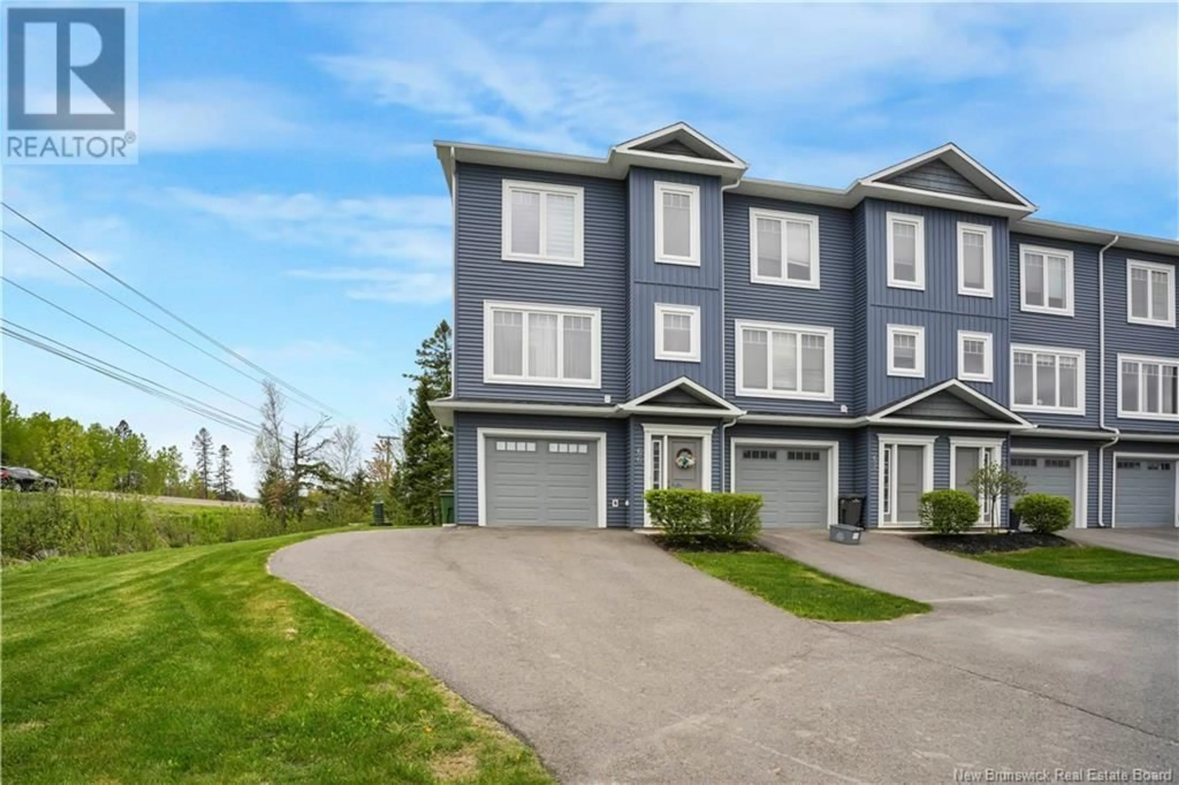 A pic from outside/outdoor area/front of a property/back of a property/a pic from drone, unknown for 66 MIA CIRCLE, Fredericton New Brunswick E3A7N5