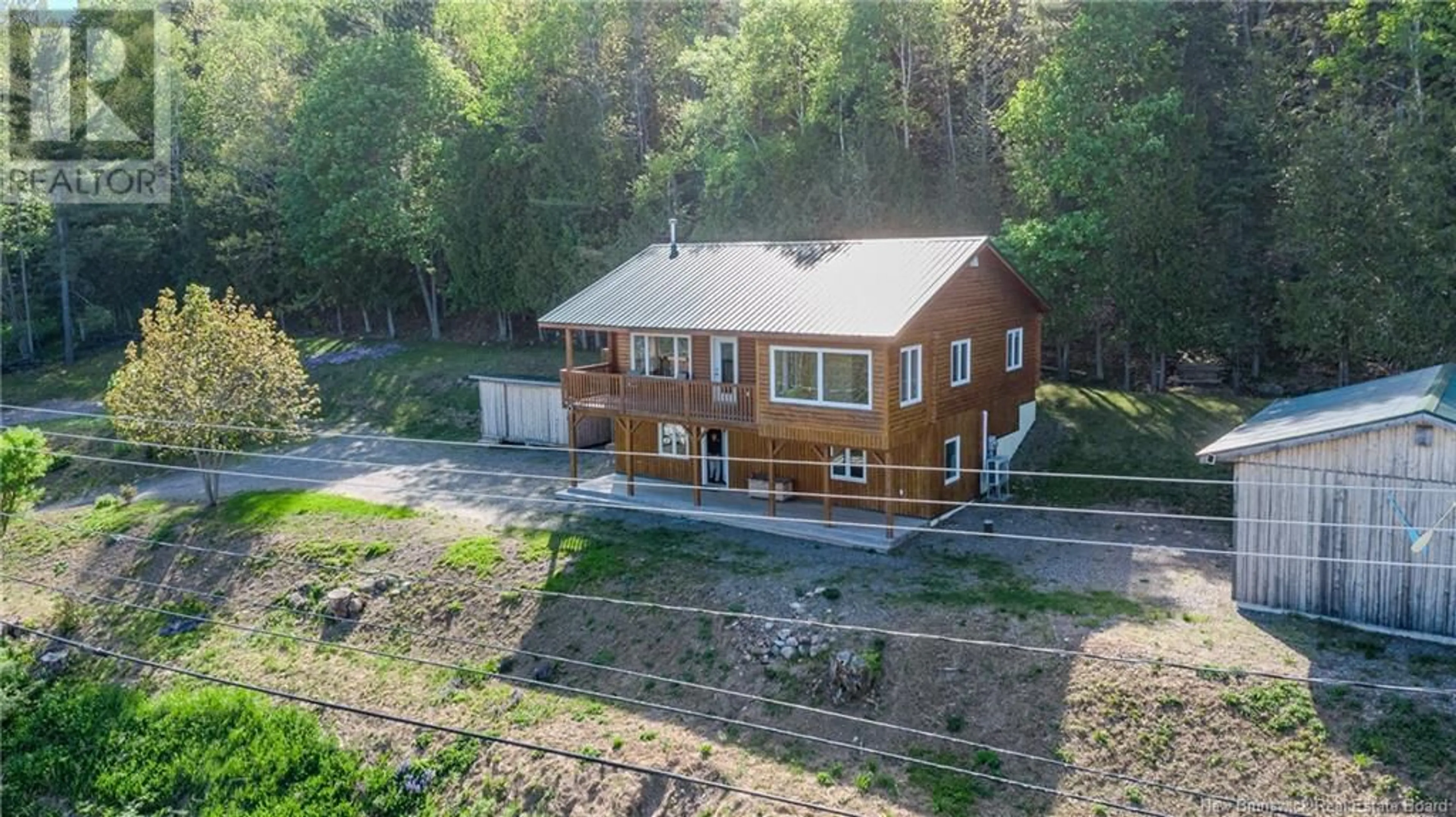 A pic from outside/outdoor area/front of a property/back of a property/a pic from drone, unknown for 9366 ROUTE 102, Morrisdale New Brunswick E5K4N6