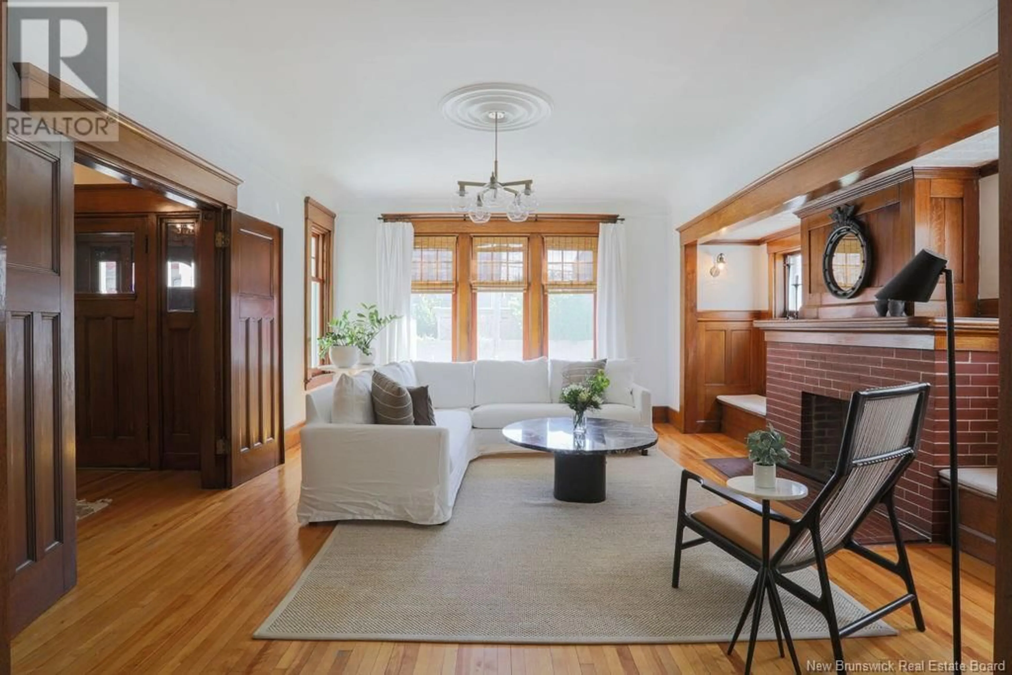 Living room with furniture, wood/laminate floor for 105 WENTWORTH STREET, Saint John New Brunswick E2L2S5