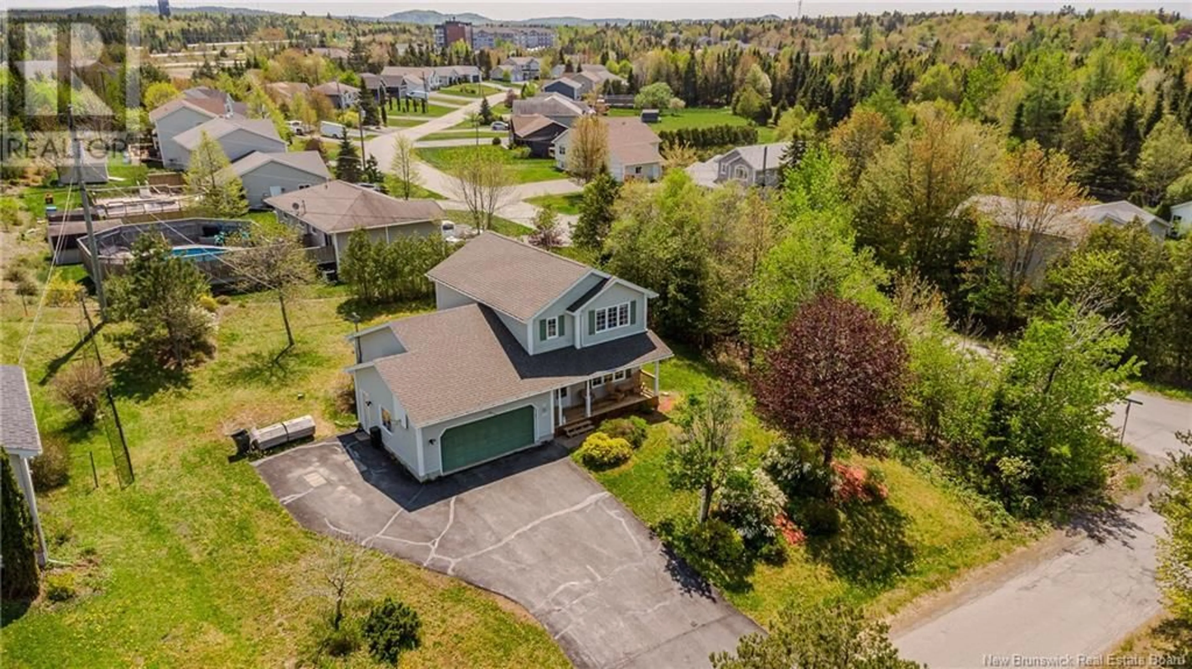 A pic from outside/outdoor area/front of a property/back of a property/a pic from drone, street for 108 CEDAR RIDGE BOULEVARD, Quispamsis New Brunswick E2E5B4