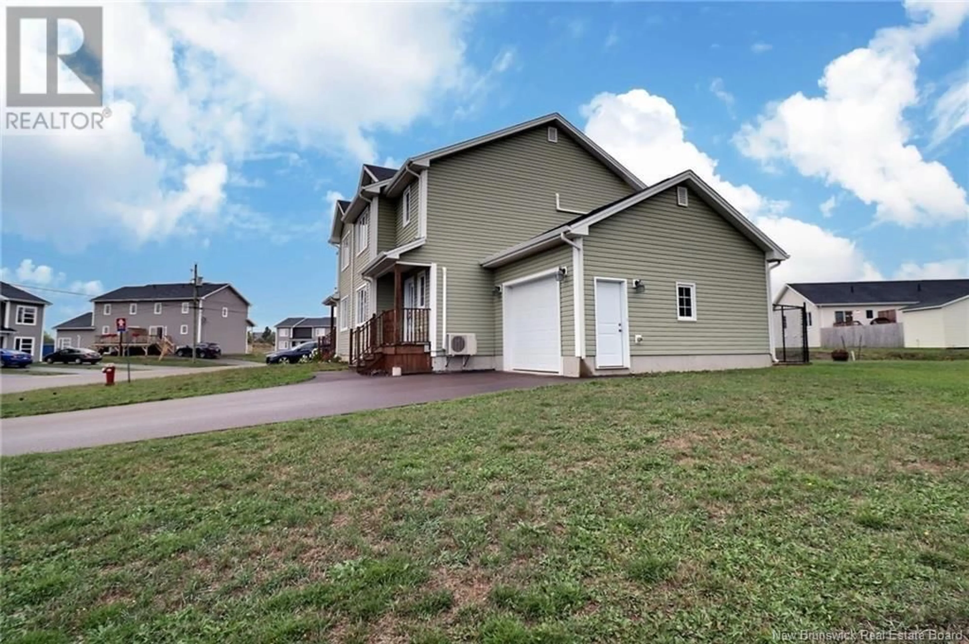 Home with vinyl exterior material, street for 203 SURETTE STREET, Dieppe New Brunswick E1A9R3