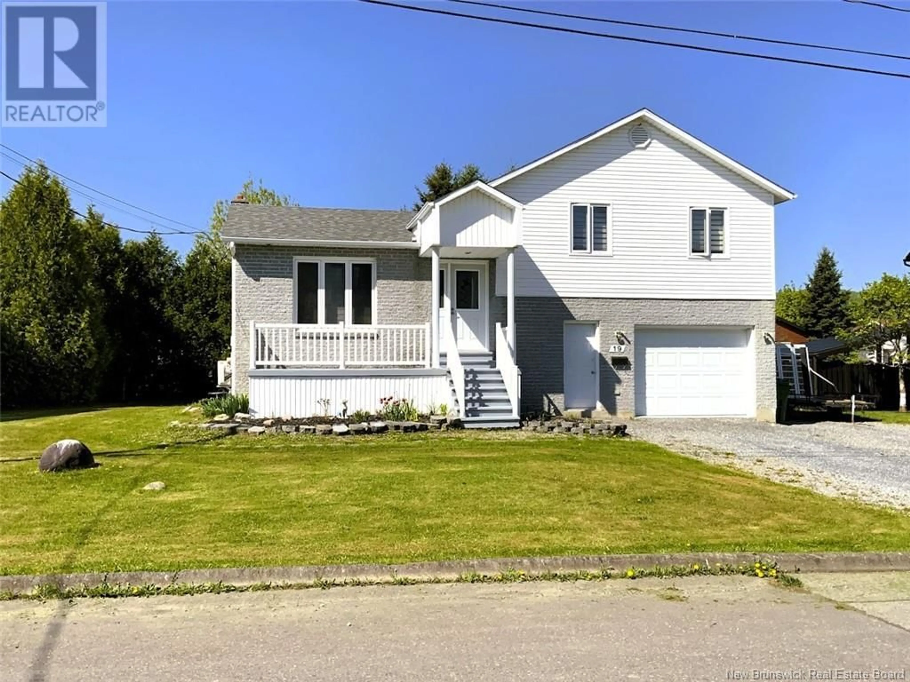 Home with vinyl exterior material, street for 19 DES CHAMPS STREET, Edmundston New Brunswick E3V4B8
