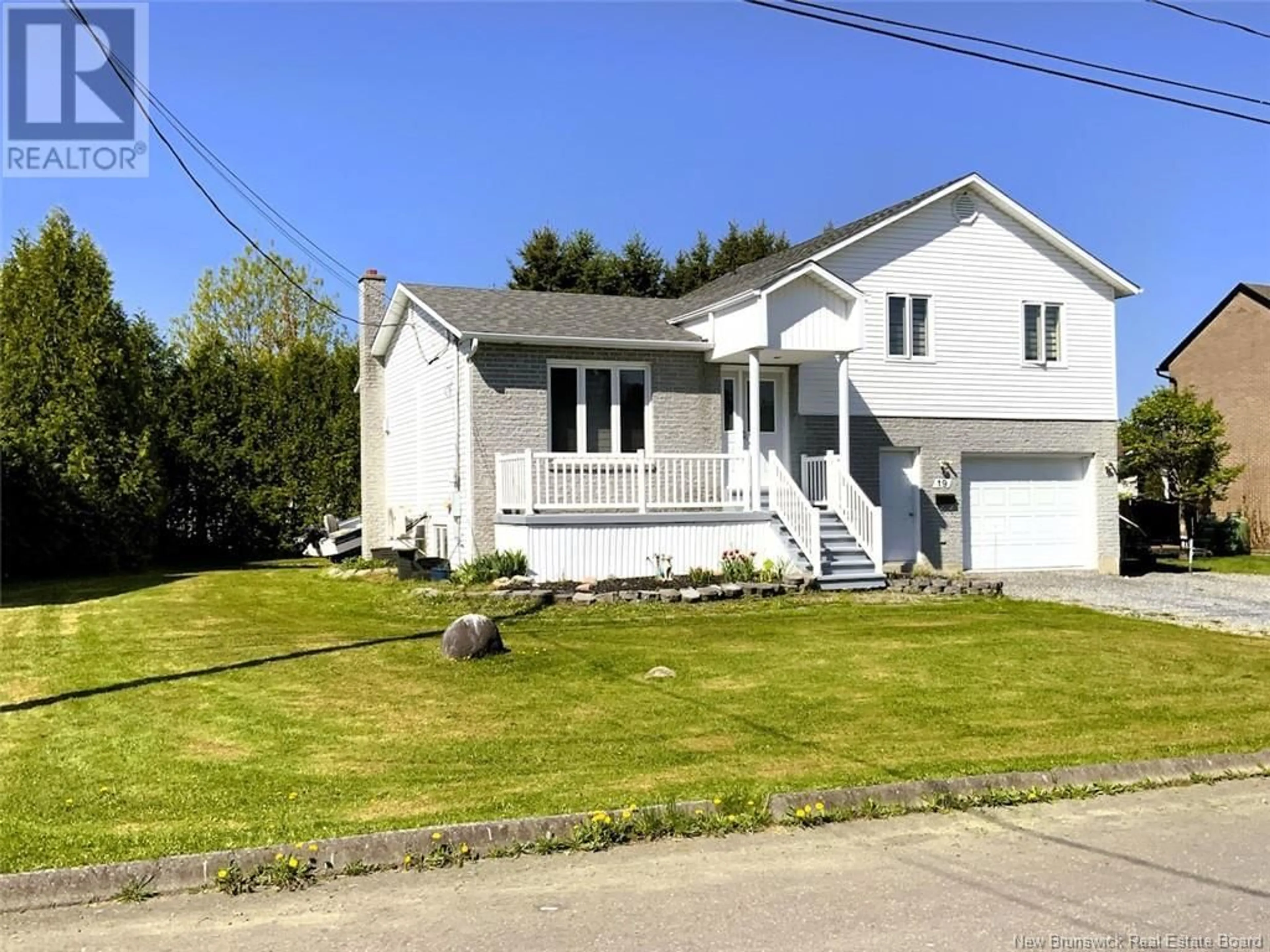 Home with vinyl exterior material, street for 19 DES CHAMPS STREET, Edmundston New Brunswick E3V4B8