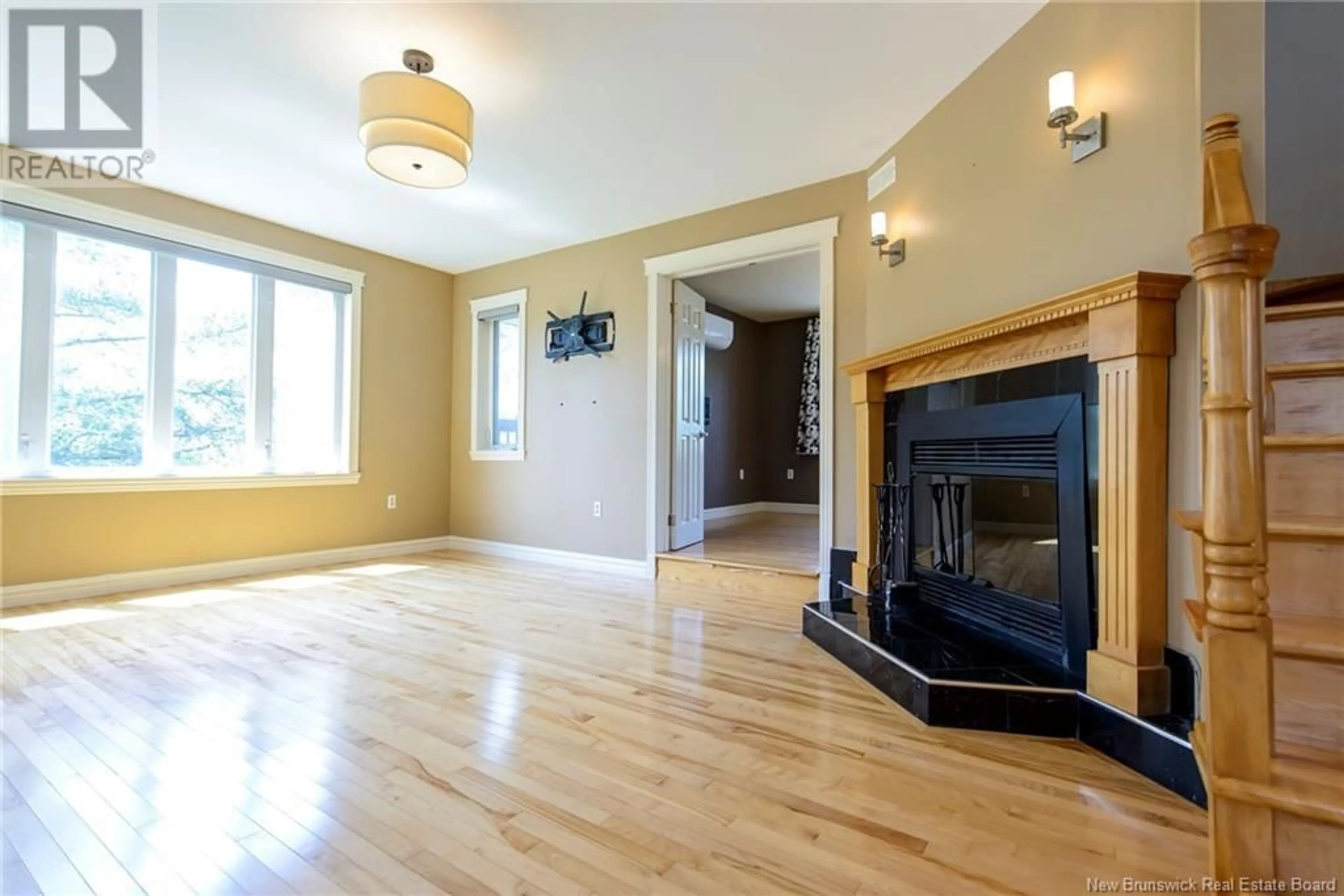 Living room with furniture, wood/laminate floor for 29 VISTA RIDGE CRESCENT, Saint John New Brunswick E2J4G4