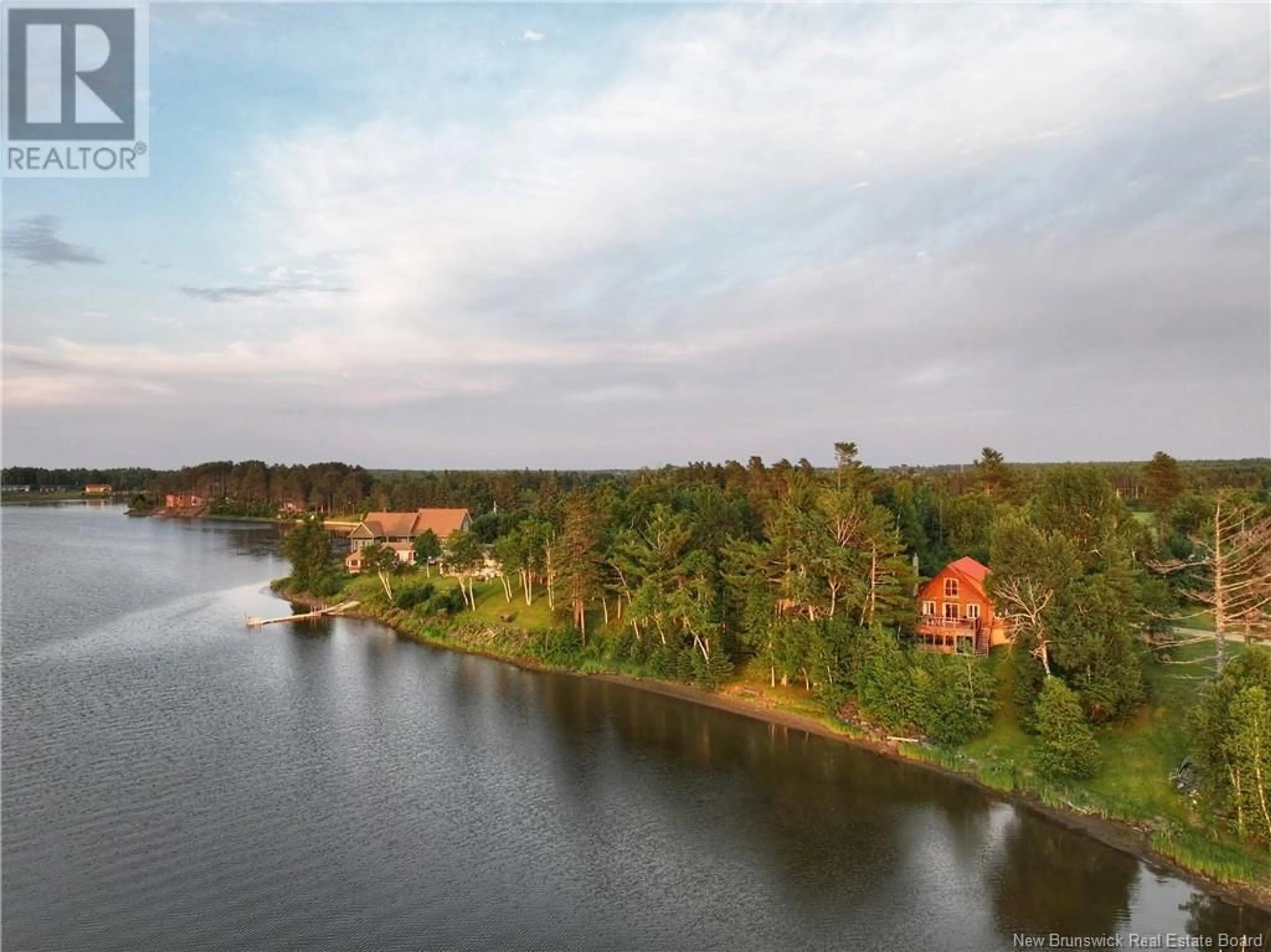 A pic from outside/outdoor area/front of a property/back of a property/a pic from drone, water/lake/river/ocean view for 17 CHEM. PONT ODILON, Petit-Tracadie New Brunswick E1X3P8