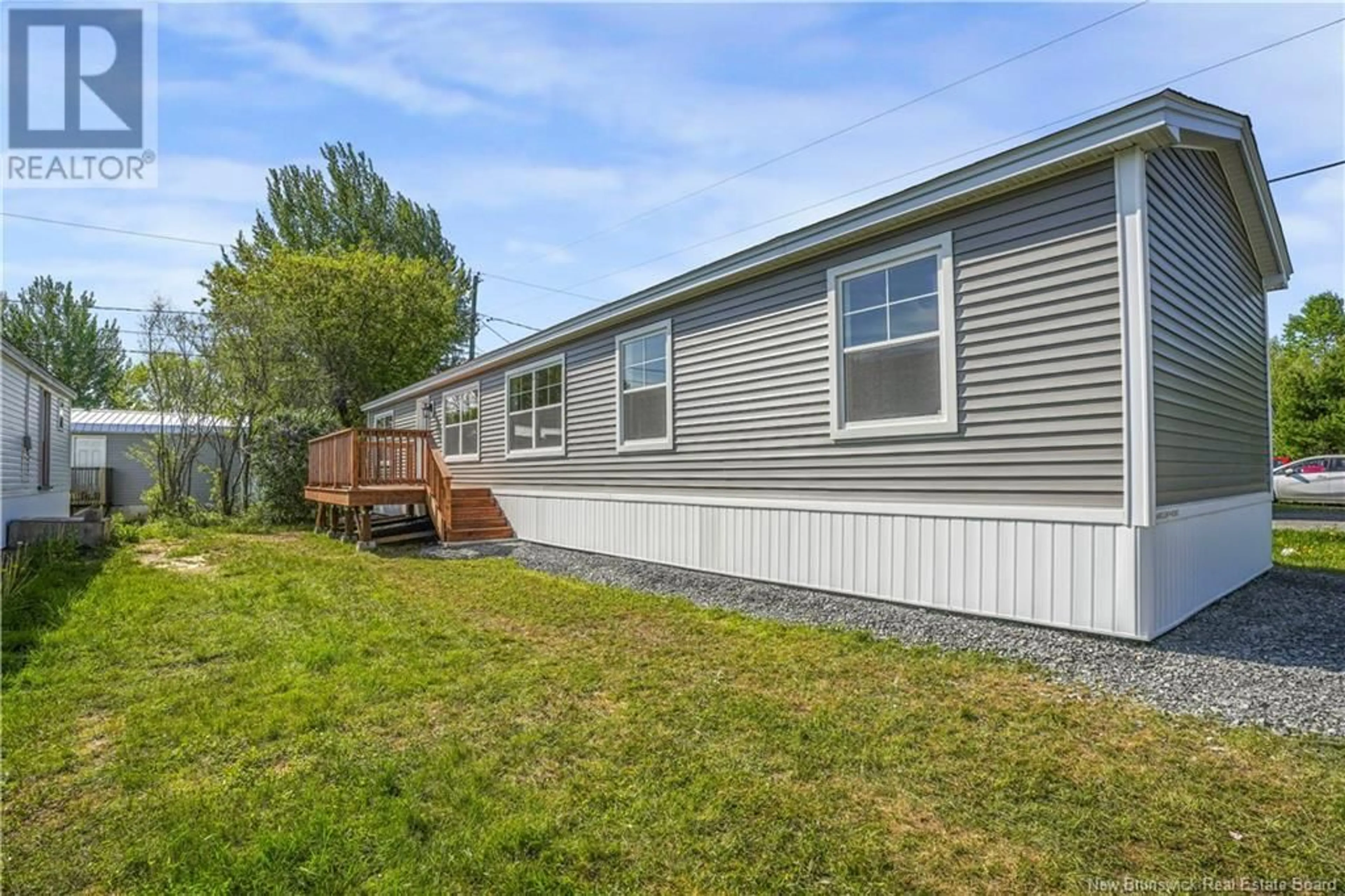 Home with vinyl exterior material, unknown for 215 MOORE STREET, Fredericton New Brunswick E3B8L8