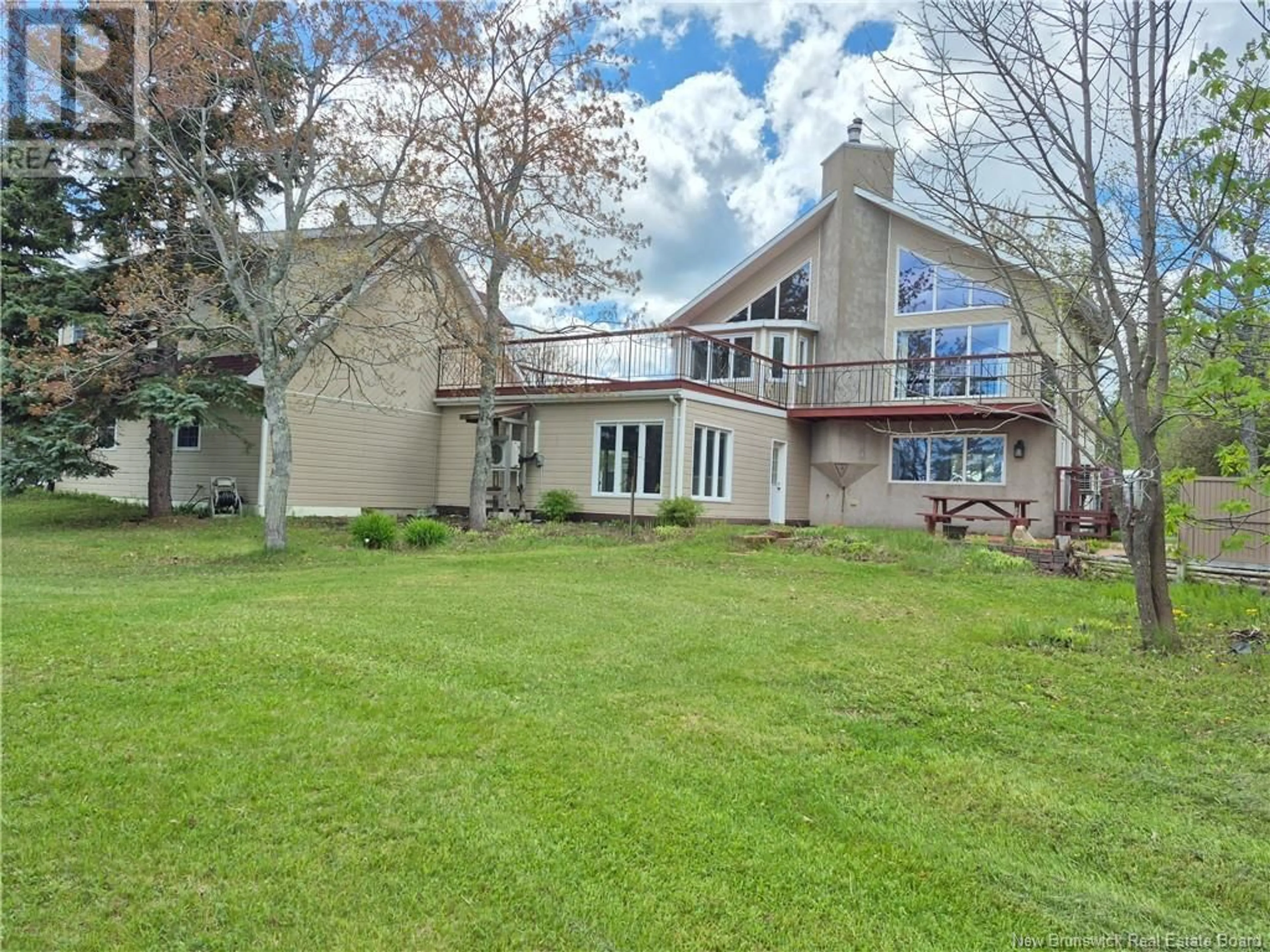 A pic from outside/outdoor area/front of a property/back of a property/a pic from drone, water/lake/river/ocean view for 619 RUE DE LA BAIE, Beresford New Brunswick E8K1X3