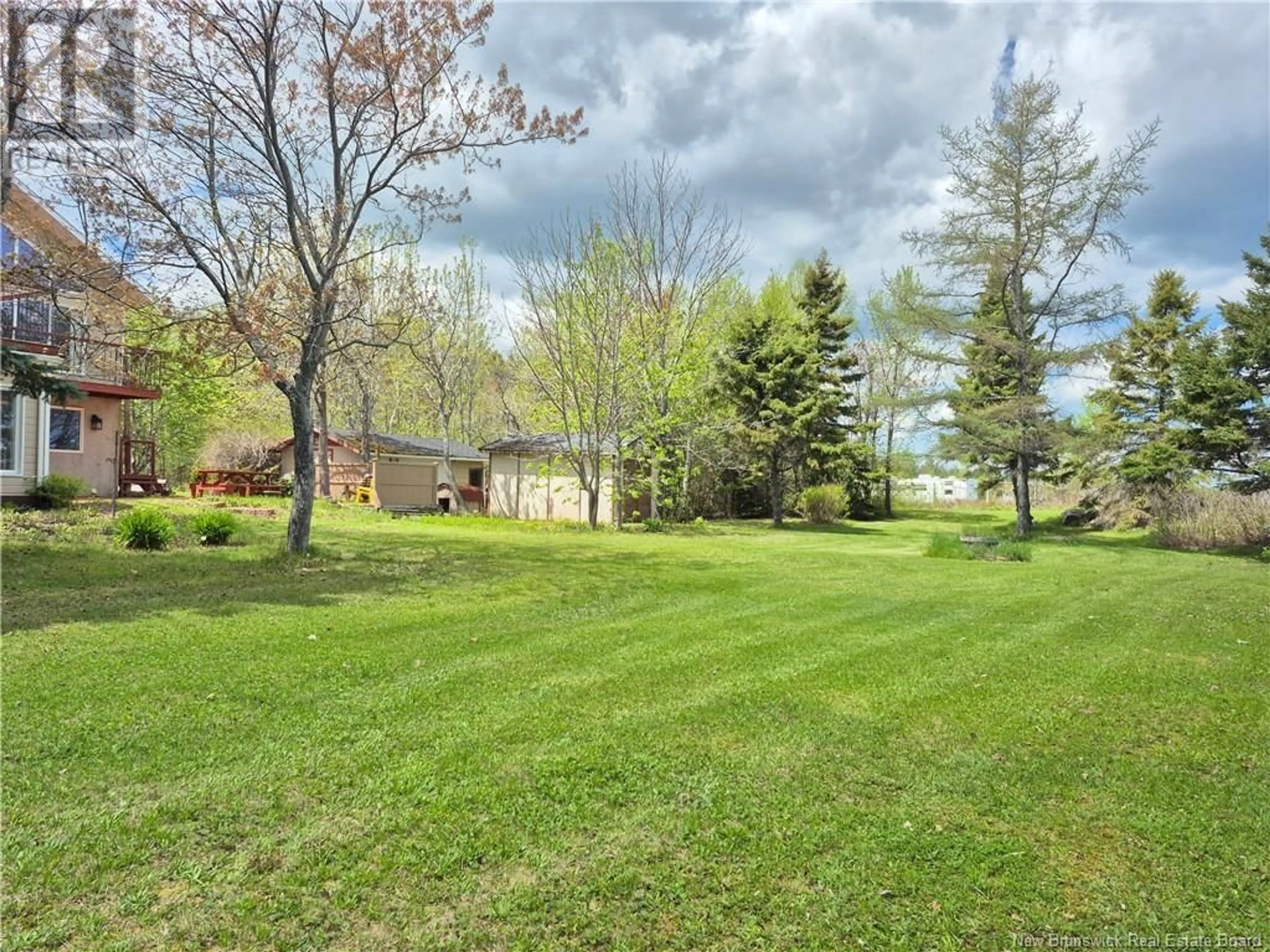 A pic from outside/outdoor area/front of a property/back of a property/a pic from drone, unknown for 619 RUE DE LA BAIE, Beresford New Brunswick E8K1X3