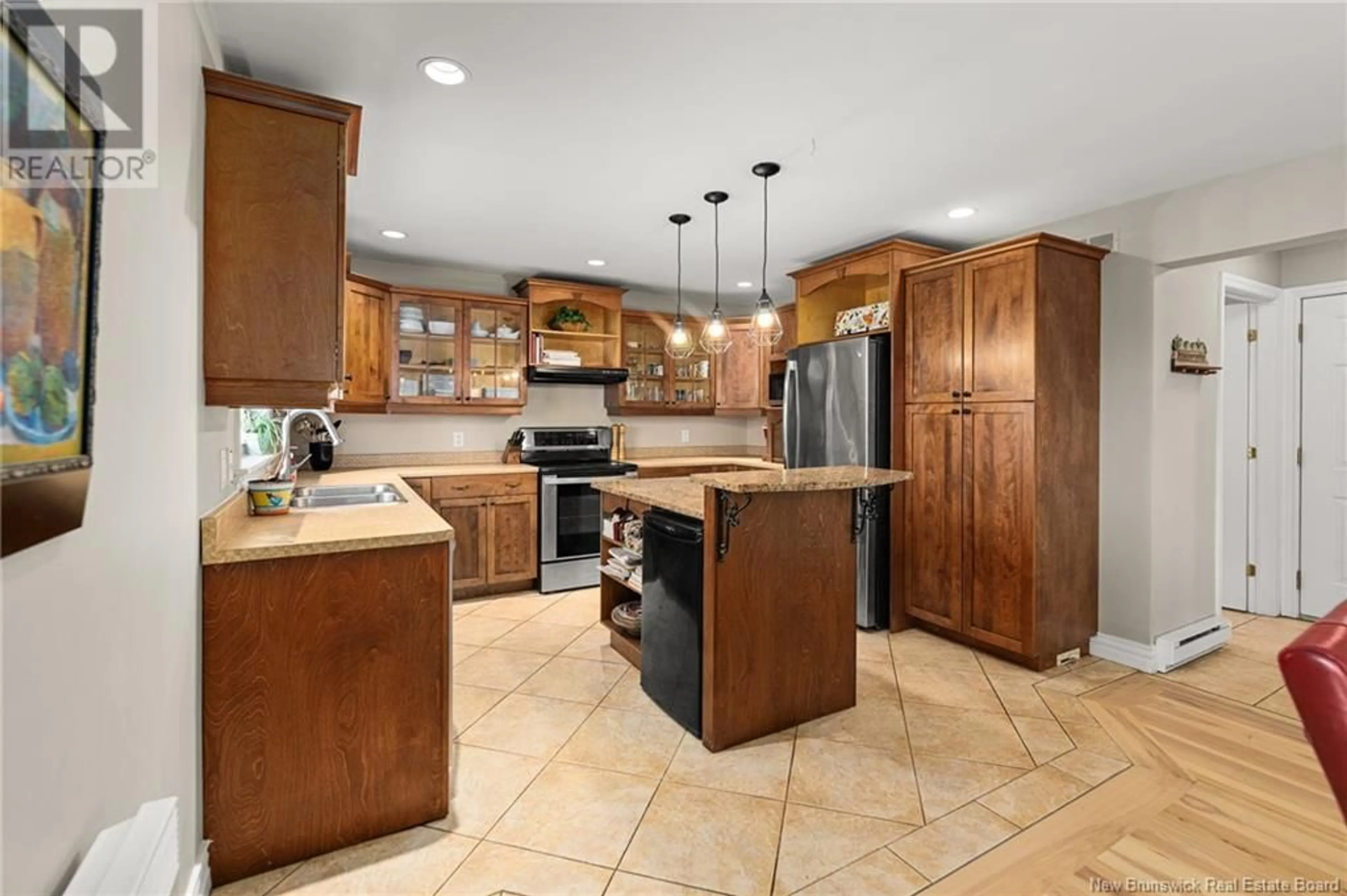 Open concept kitchen, ceramic/tile floor for 218 TWIN OAKS DRIVE, Moncton New Brunswick E1G4W4